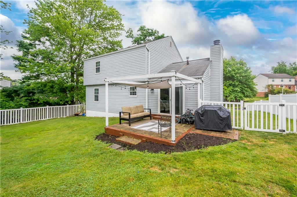 201 Arcola Drive Coraopolis, PA 15108 - Photo 27 of 33 a view of a house with backyard porch and furniture