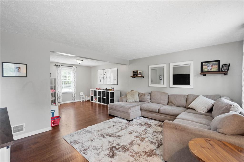 201 Arcola Drive Coraopolis, PA 15108 - Photo 4 of 33 a living room with furniture wooden floor and a window