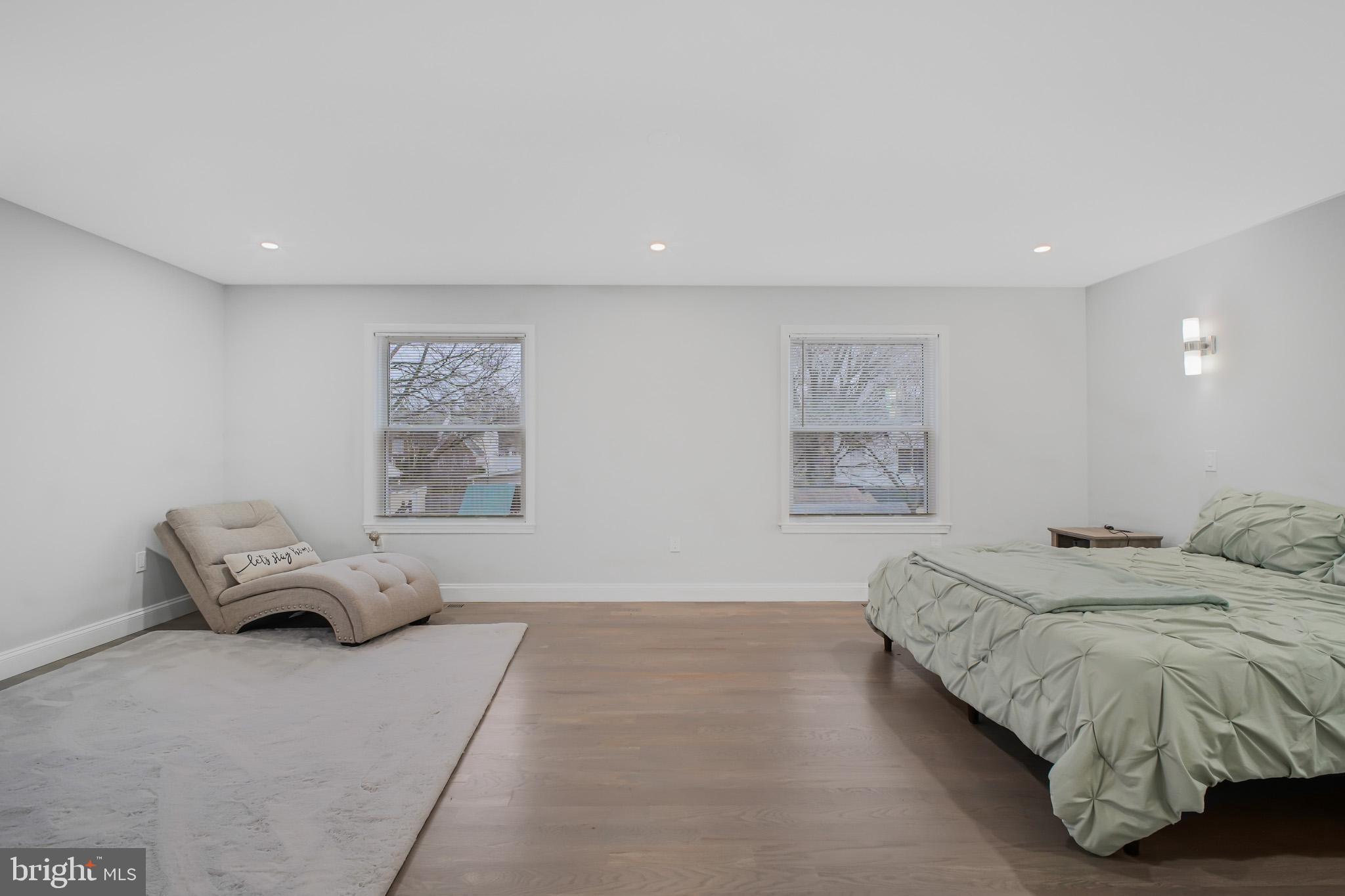 8227 Frye Road Alexandria, VA 22309 - Photo 13 of 45 a bedroom with a bed and couch