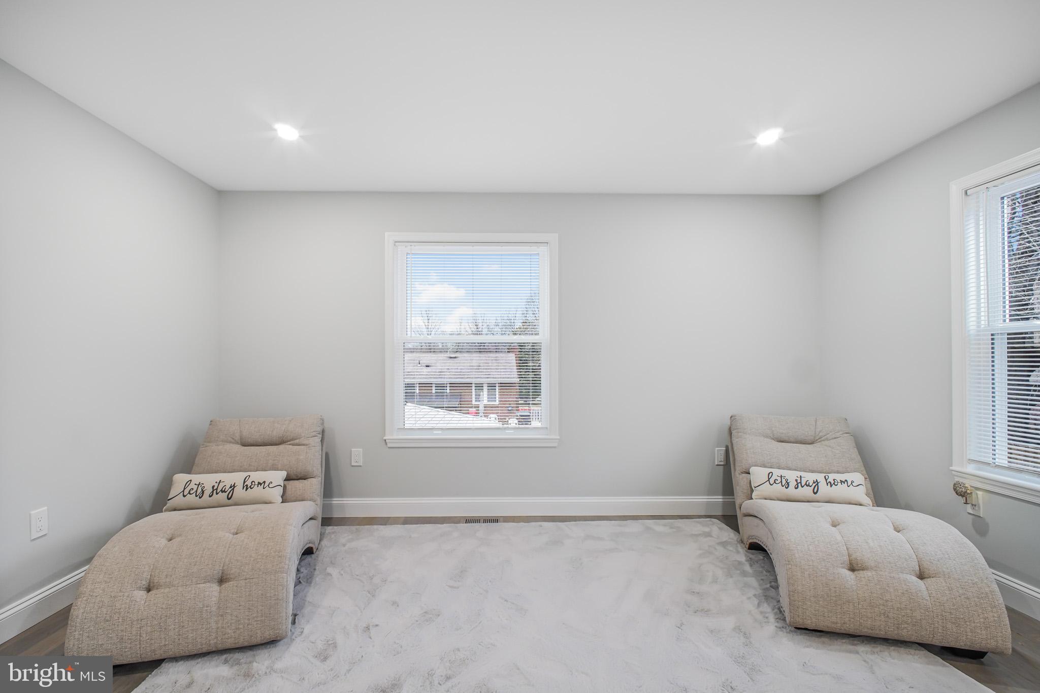 8227 Frye Road Alexandria, VA 22309 - Photo 16 of 45 a room with a bed and a window