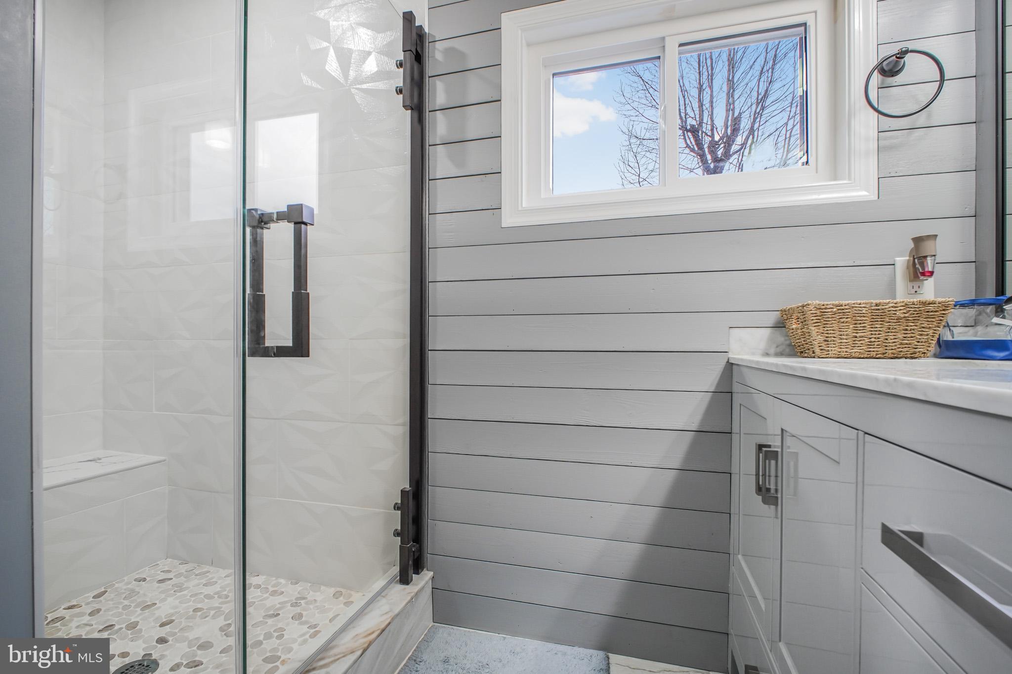 8227 Frye Road Alexandria, VA 22309 - Photo 17 of 45 a bathroom with a sink and a shower