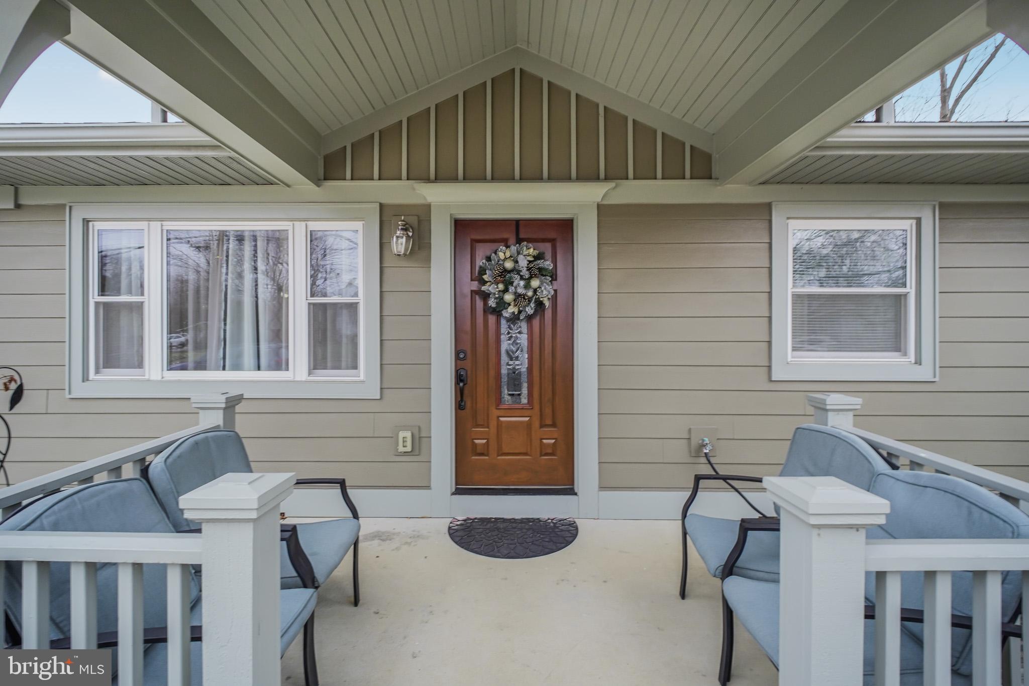 8227 Frye Road Alexandria, VA 22309 - Photo 2 of 45 a front view of a house with entryway