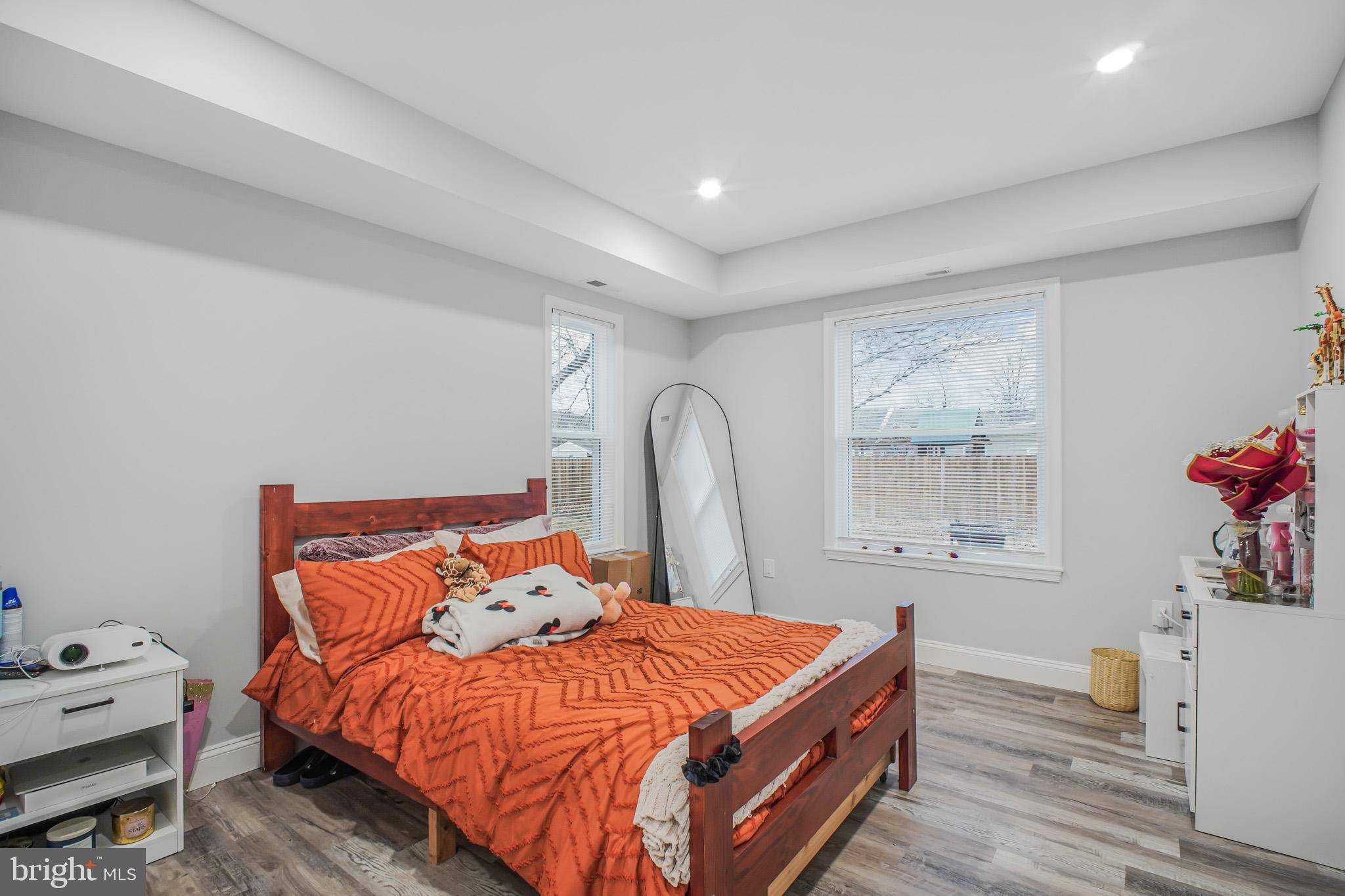 8227 Frye Road Alexandria, VA 22309 - Photo 24 of 45 a bedroom with a bed and a dresser