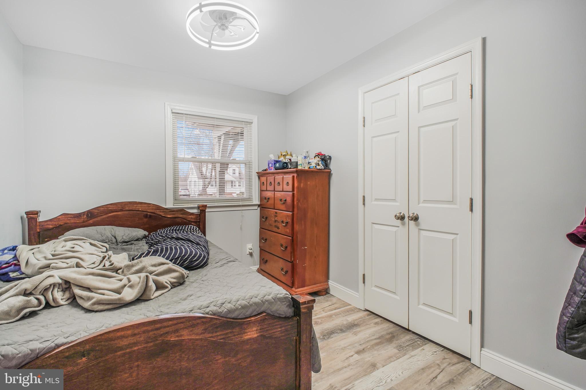 8227 Frye Road Alexandria, VA 22309 - Photo 30 of 45 a bedroom with furniture and a window