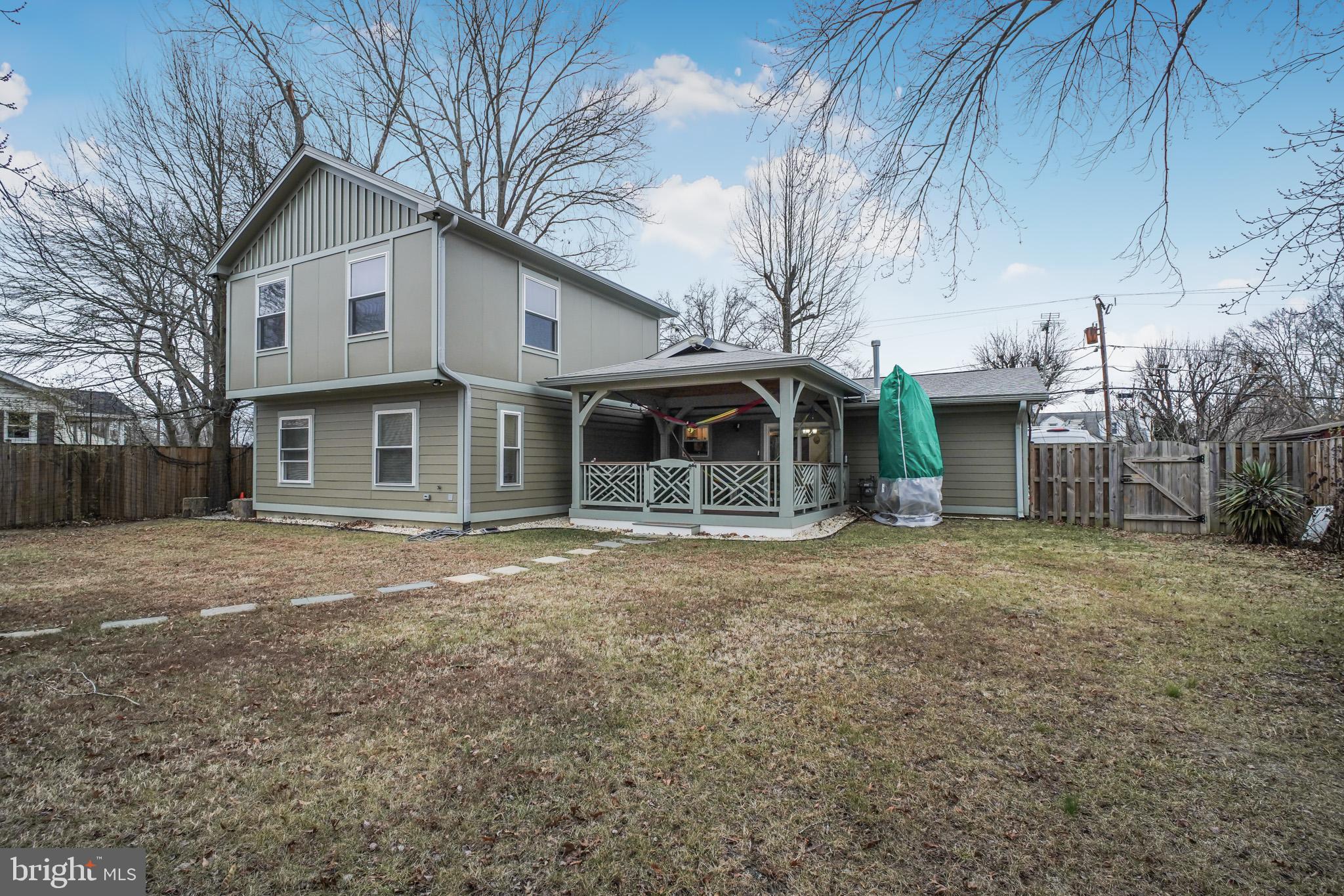 8227 Frye Road Alexandria, VA 22309 - Photo 37 of 45 a front view of a house with a garden