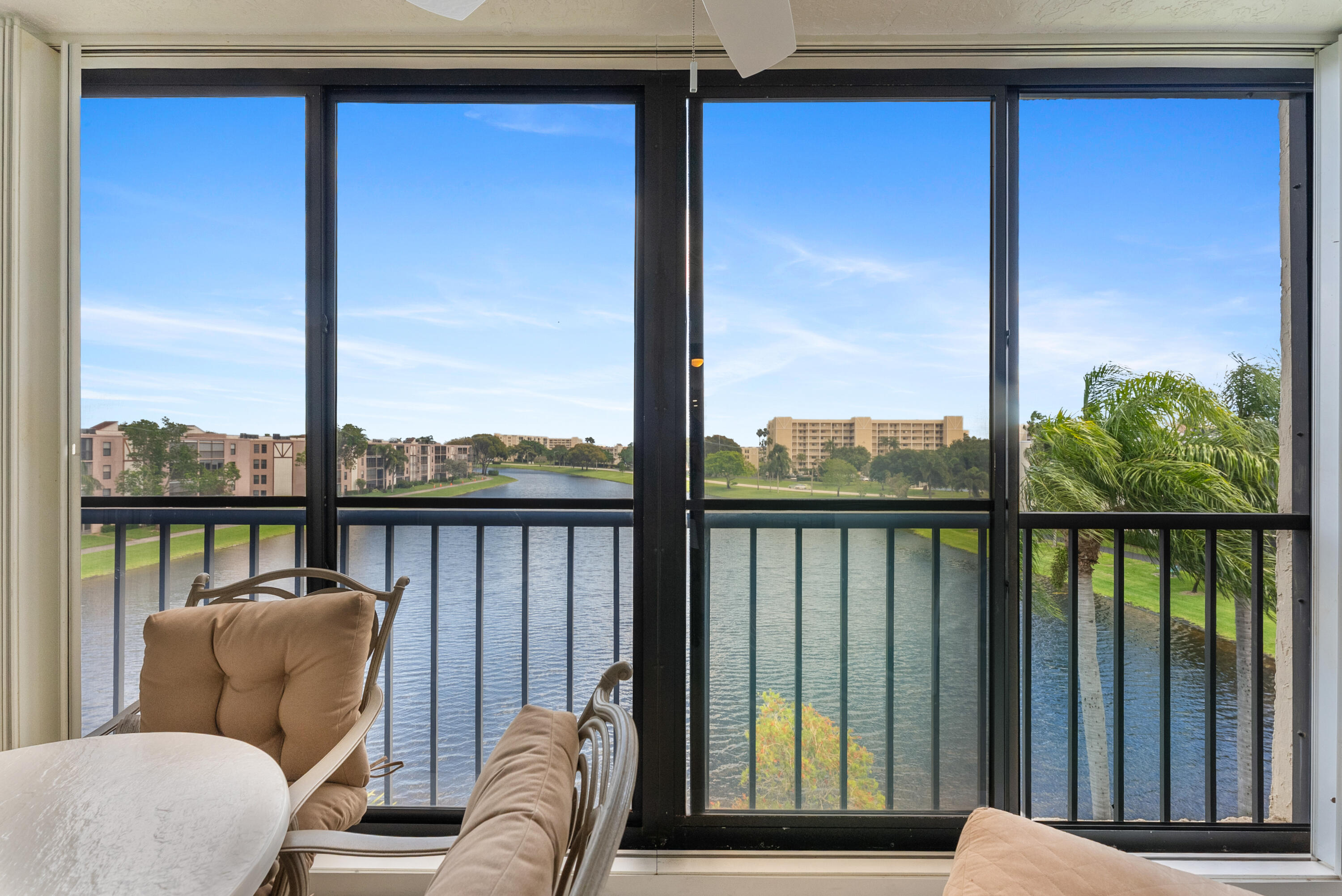 14500 Stirling Way, Unit 403 Delray Beach, FL 33446 - Photo 13 of 47 a view of a chair in the balcony