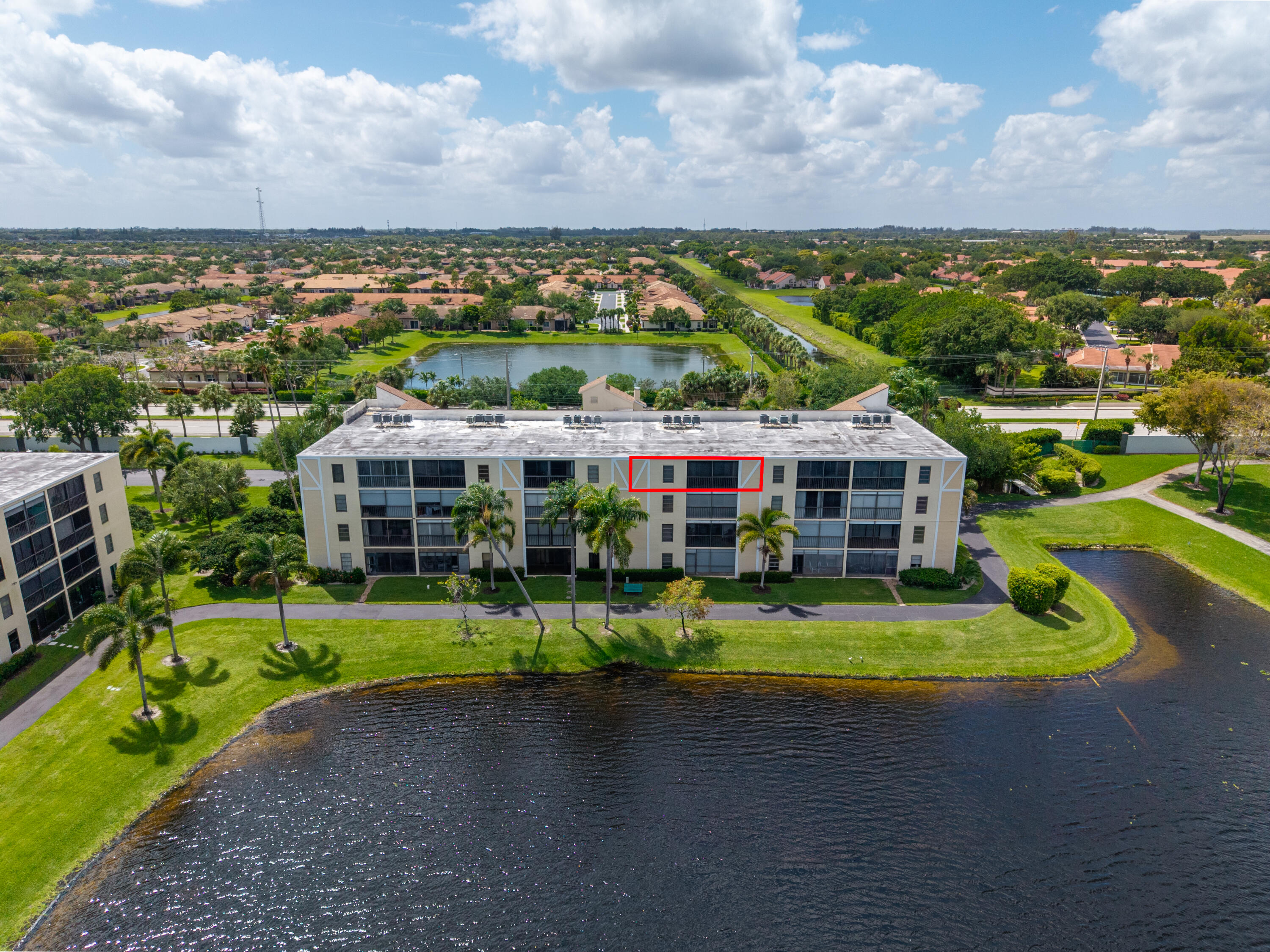 14500 Stirling Way, Unit 403 Delray Beach, FL 33446 - Photo 33 of 47 a aerial view of a house with a yard basket ball court and outdoor seating