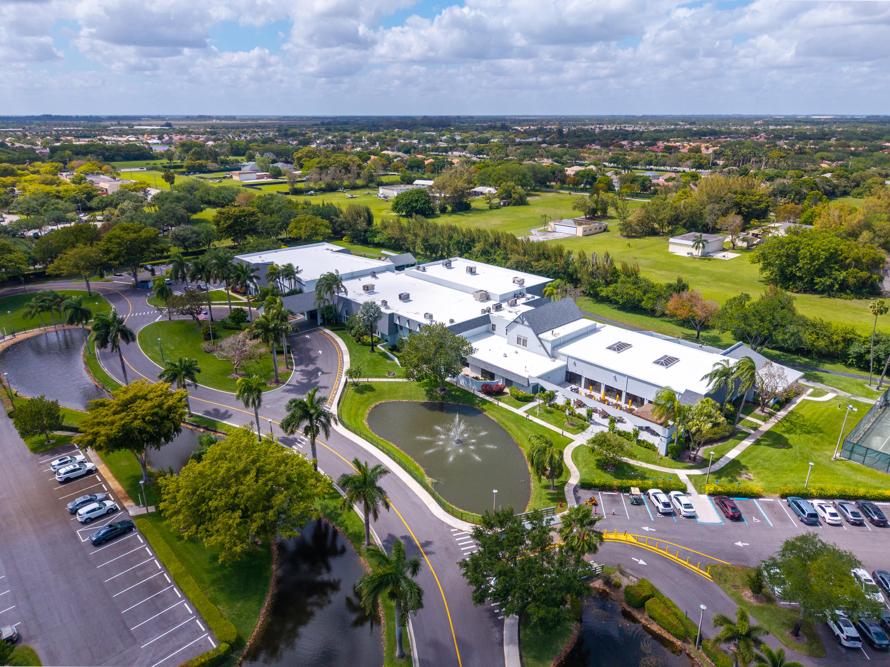 14500 Stirling Way, Unit 403 Delray Beach, FL 33446 - Photo 44 of 47 an aerial view of residential house with outdoor space and lake view