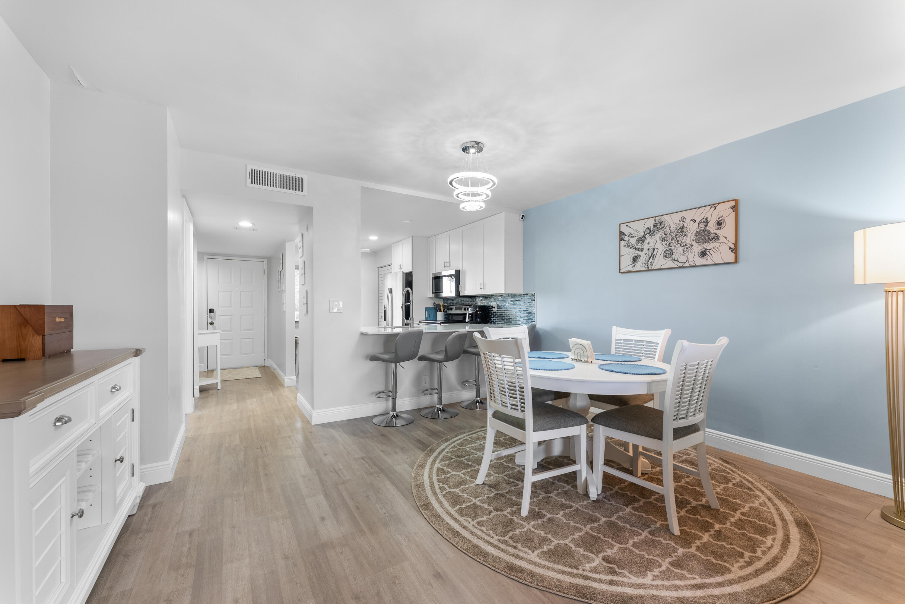14500 Stirling Way, Unit 403 Delray Beach, FL 33446 - Photo 9 of 47 a view of a dining room with furniture