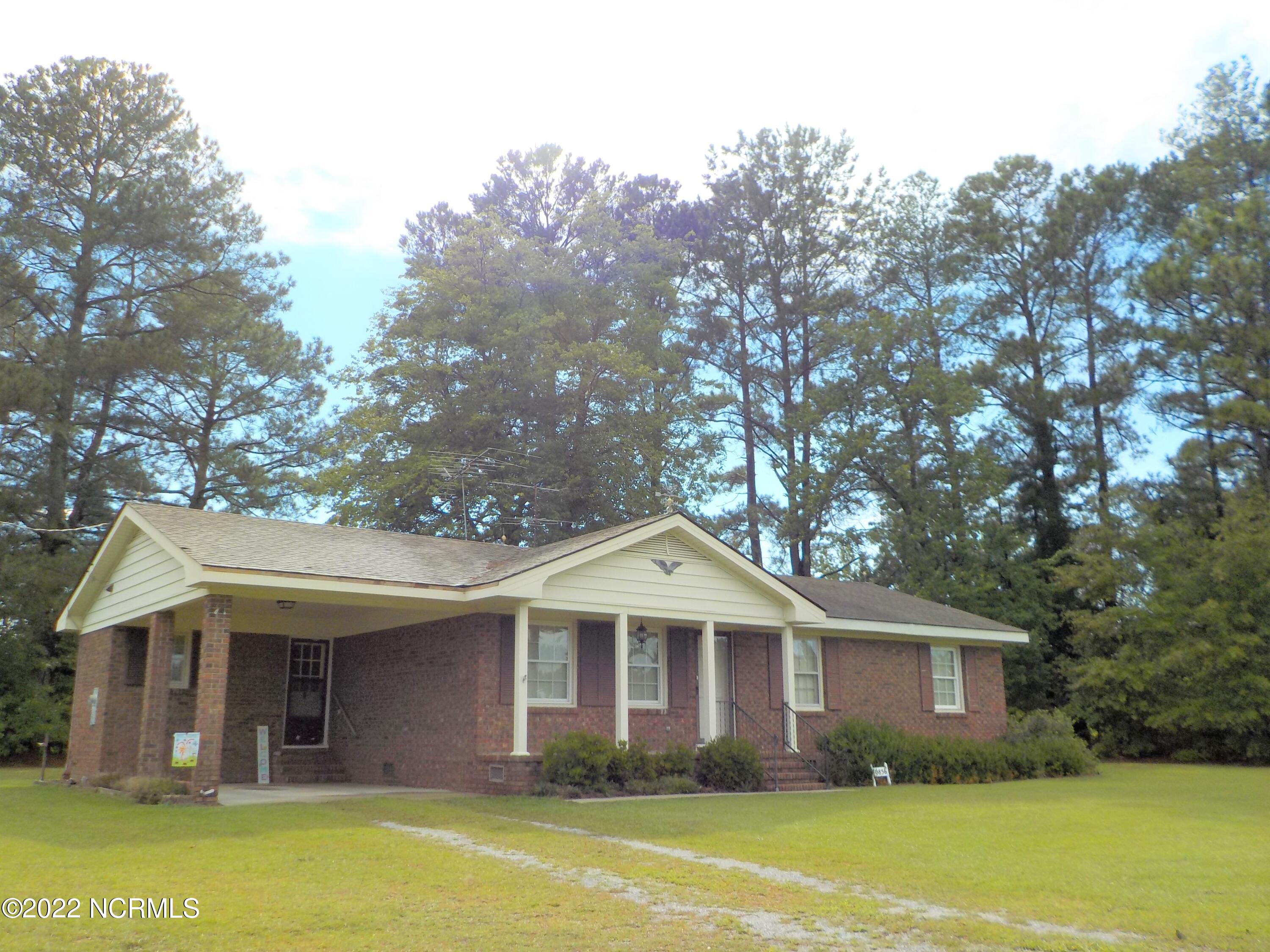 10856 Straight Gate Road Whitakers, NC 27891 - Photo 2 of 41 carport, tiled front porch