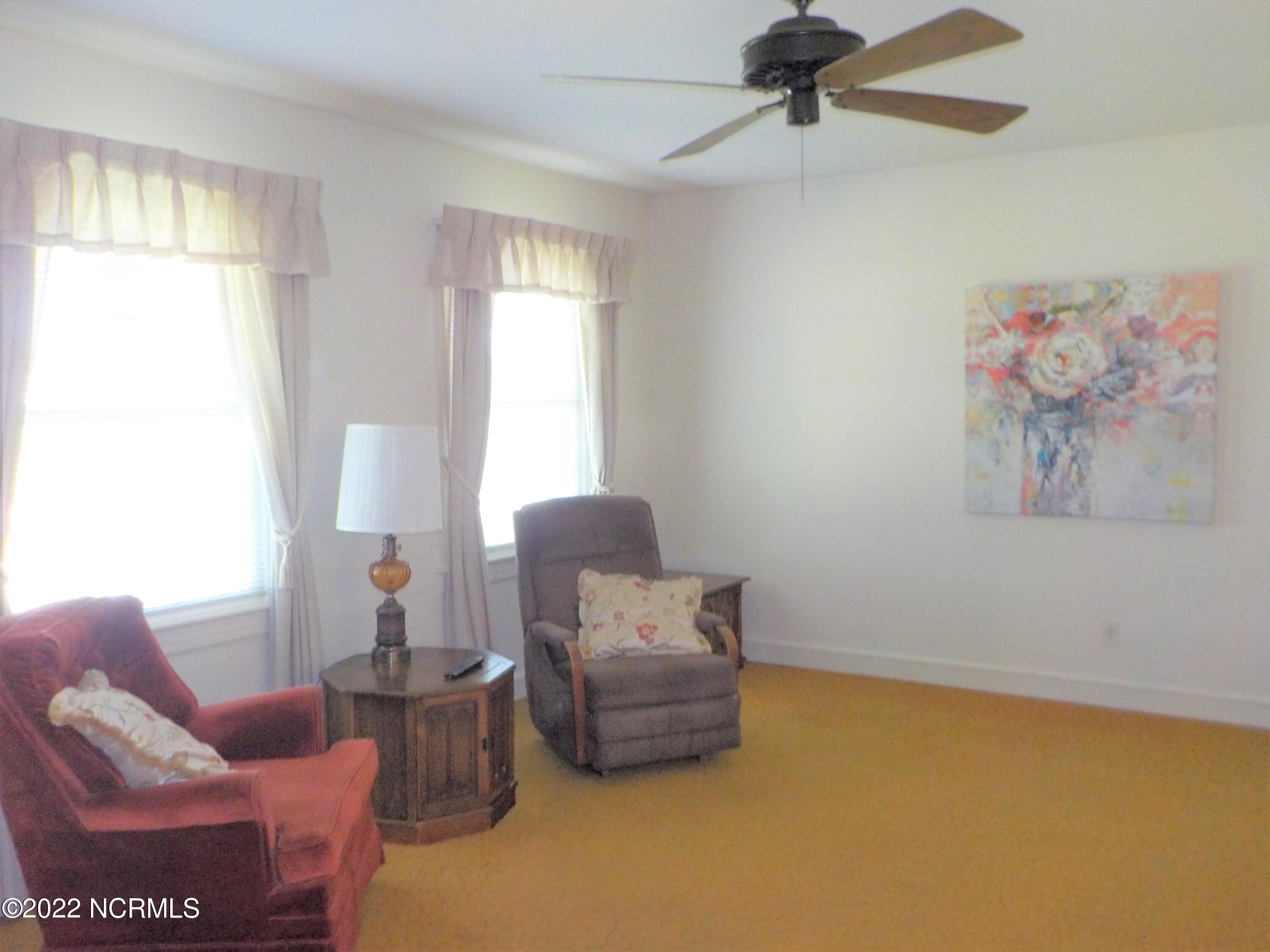 10856 Straight Gate Road Whitakers, NC 27891 - Photo 26 of 41 formal living room, hardwood under carpet