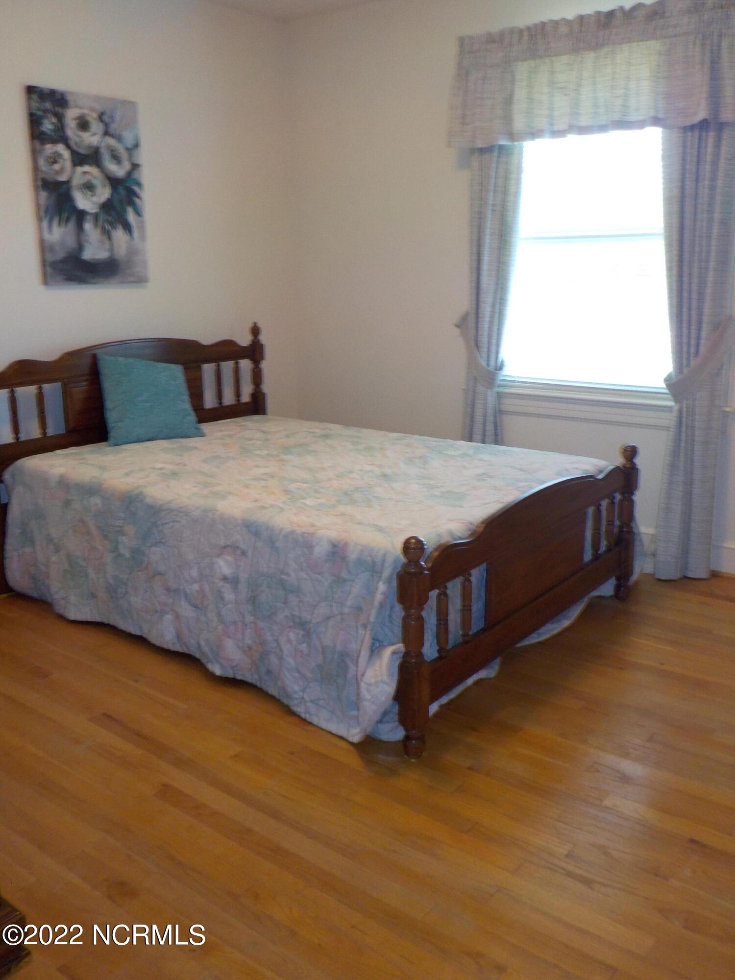 10856 Straight Gate Road Whitakers, NC 27891 - Photo 30 of 41 bedroom with hardwood floors