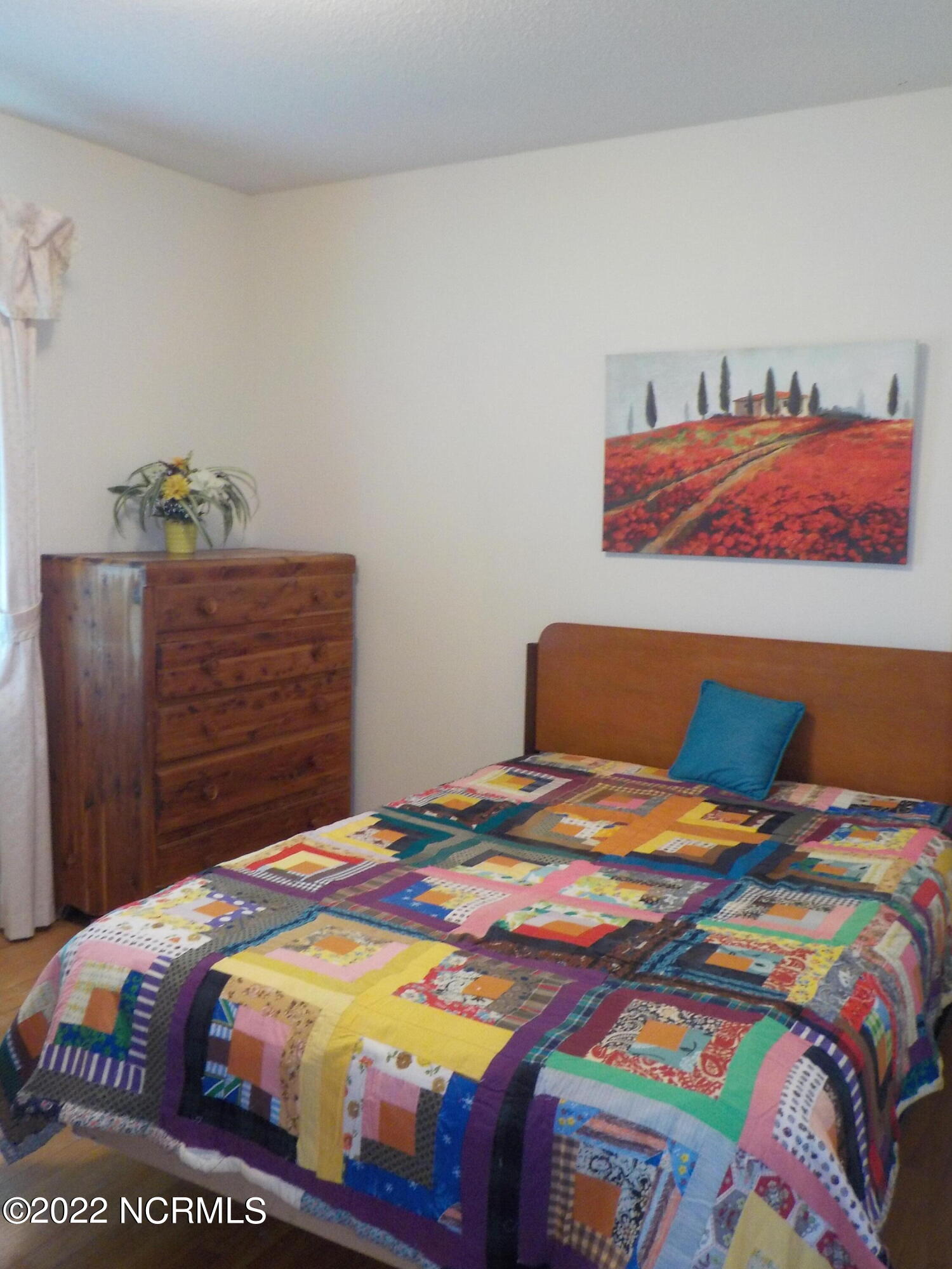 10856 Straight Gate Road Whitakers, NC 27891 - Photo 31 of 41 bedroom with hardwood floors