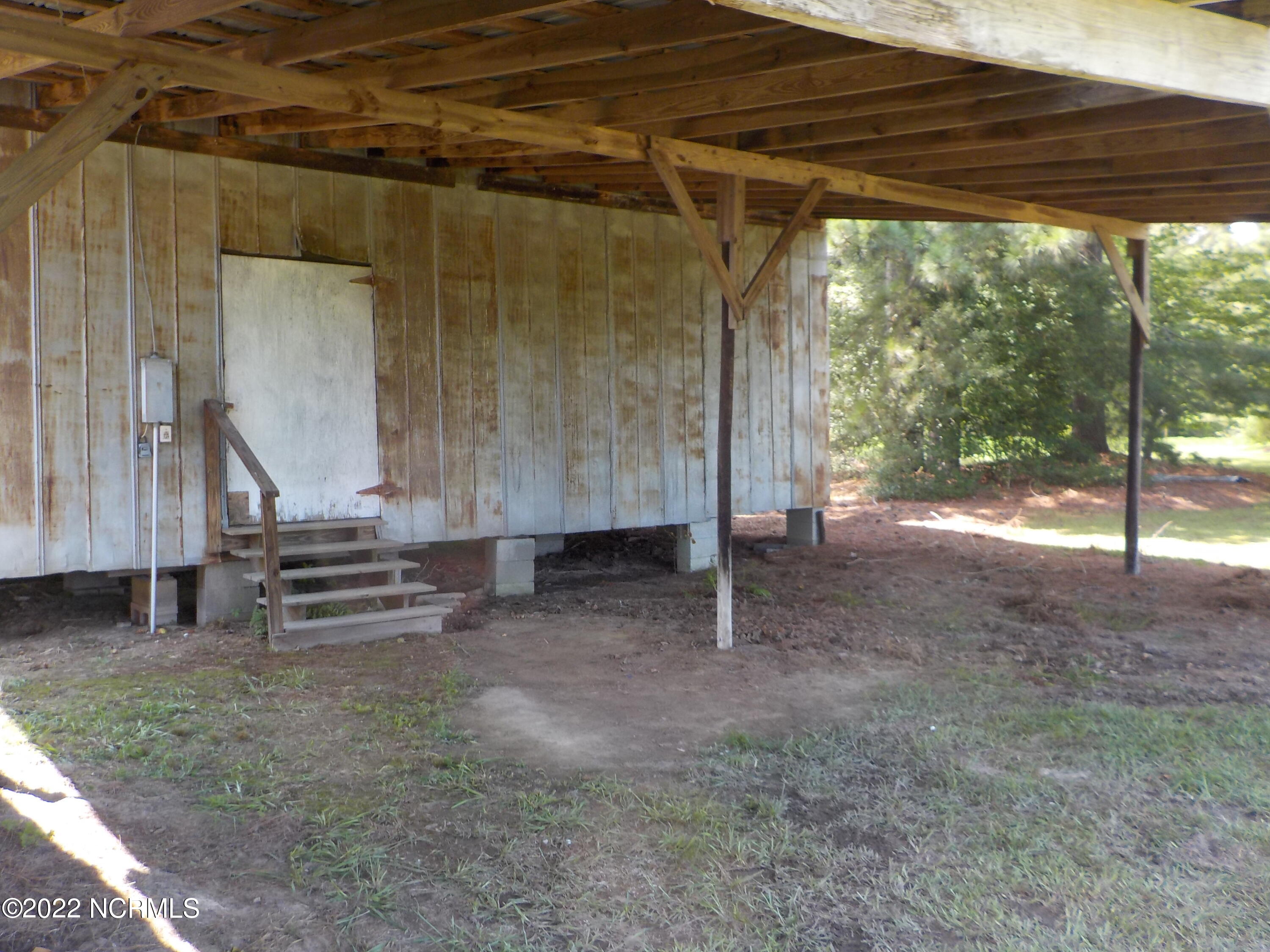 10856 Straight Gate Road Whitakers, NC 27891 - Photo 36 of 41 pack house with covered shelter