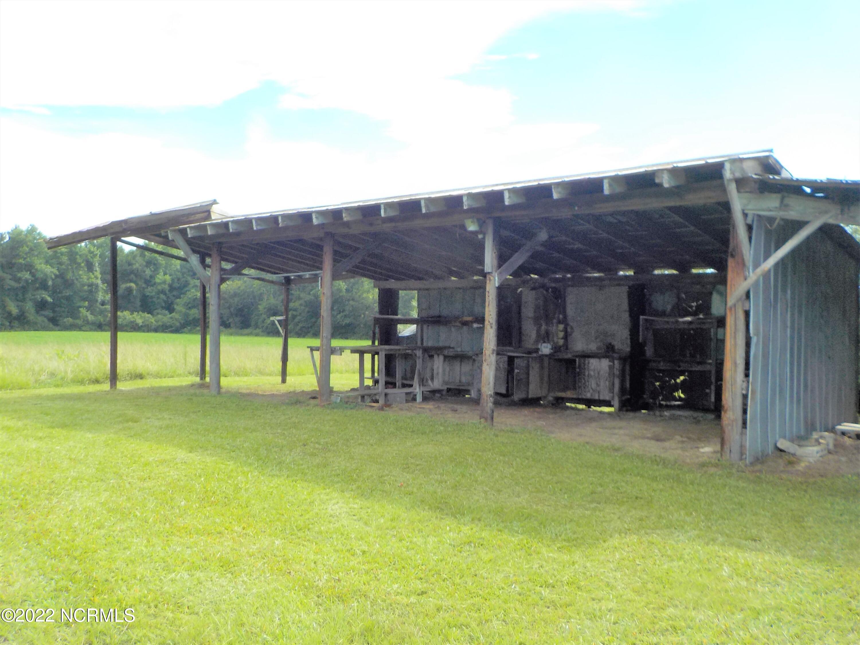 10856 Straight Gate Road Whitakers, NC 27891 - Photo 39 of 41 shelter for lawn mowers, bikes, etc