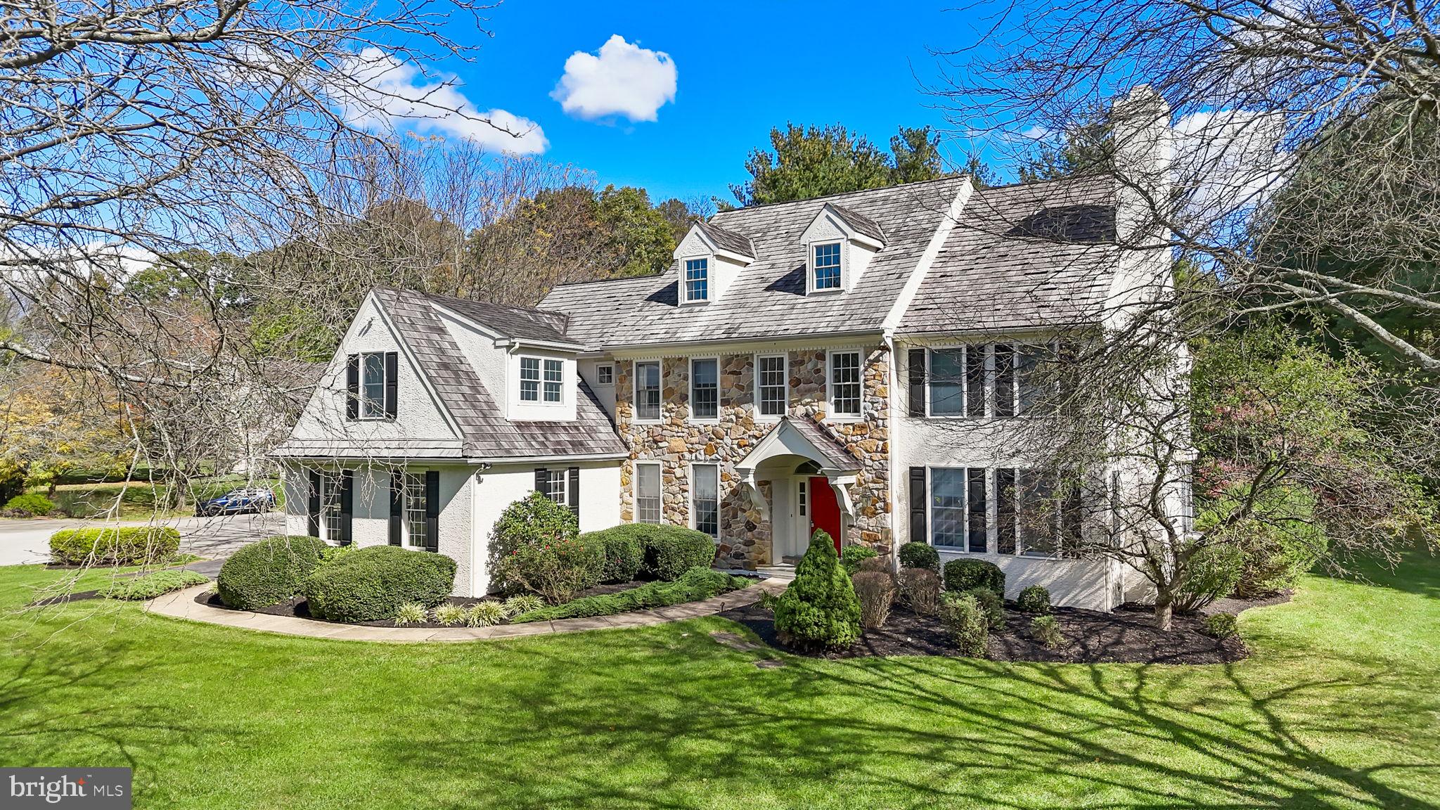 696 Paddock Circle West Chester, PA 19382 - Photo 1 of 43 a front view of a house with a yard