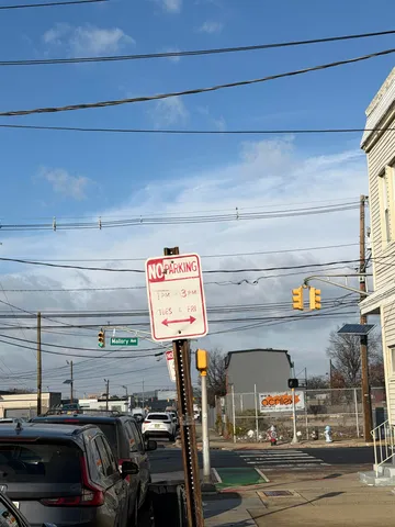 a view of a street with cars