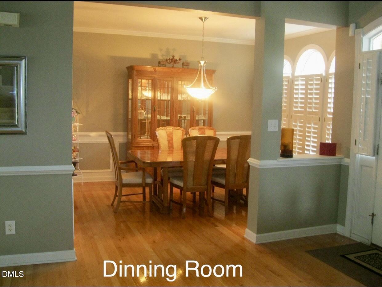 12400 Village Gate Way Raleigh, NC 27614 - Photo 5 of 34 a view of a dining area with furniture window and outside view