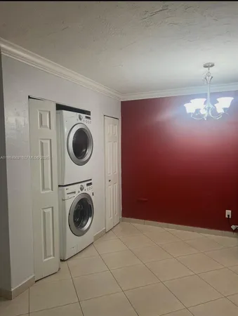 a view of a storage & utility room with a washer and dryer