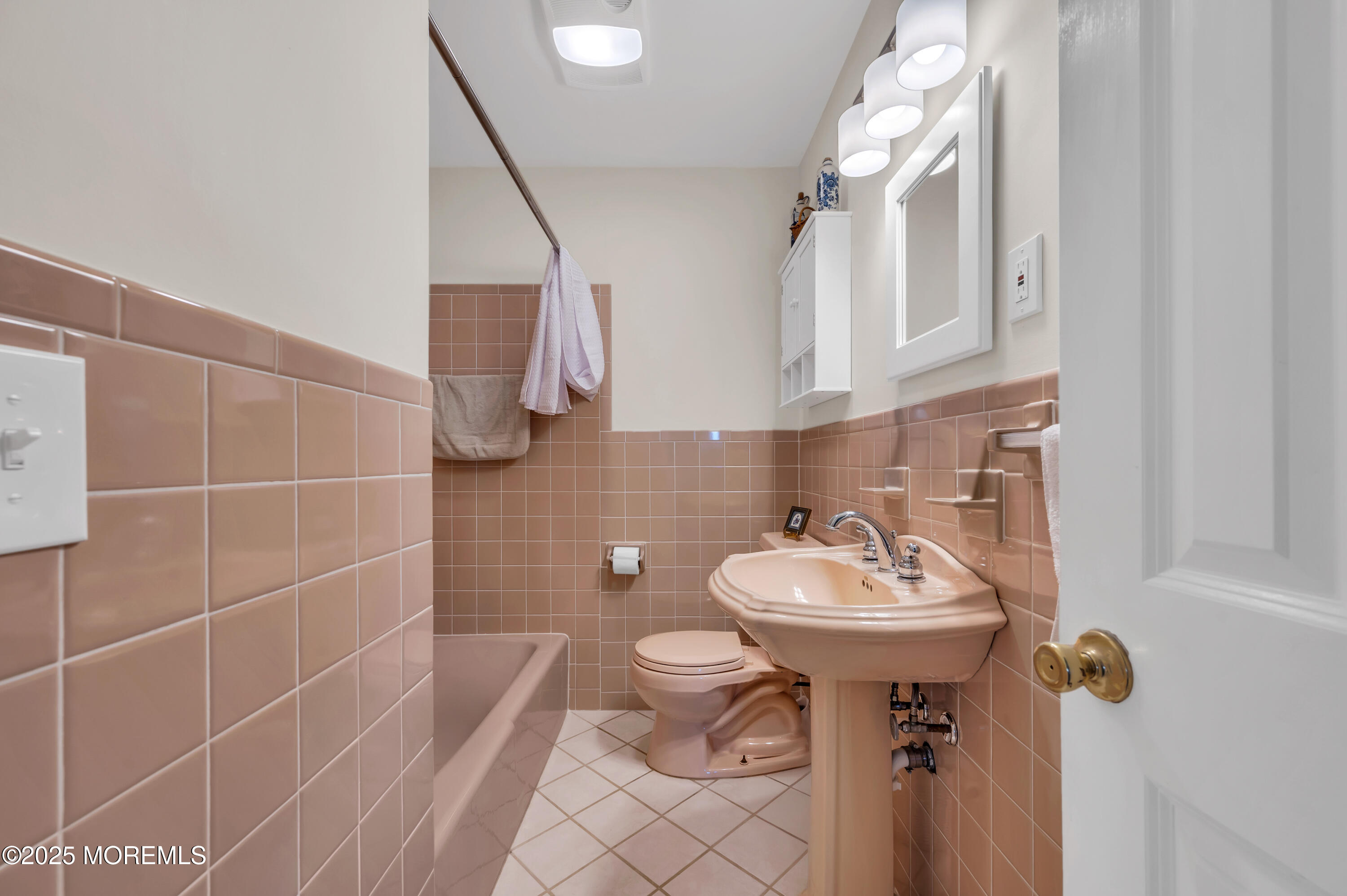 837 Forepeak Drive Forked River, NJ 08731 - Photo 15 of 55 a bathroom with a sink toilet and a mirror