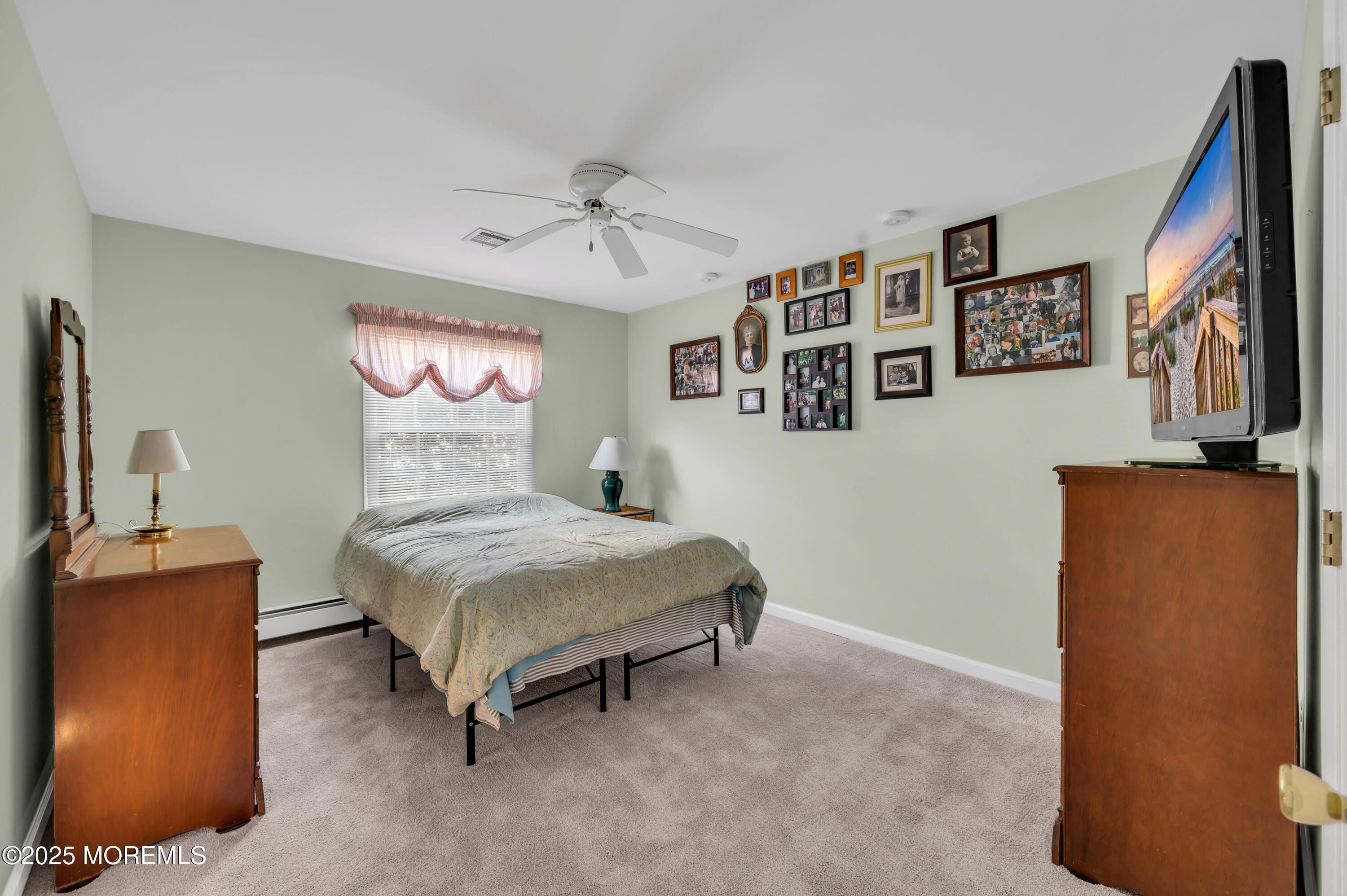 837 Forepeak Drive Forked River, NJ 08731 - Photo 17 of 55 a bedroom with a bed and cabinets