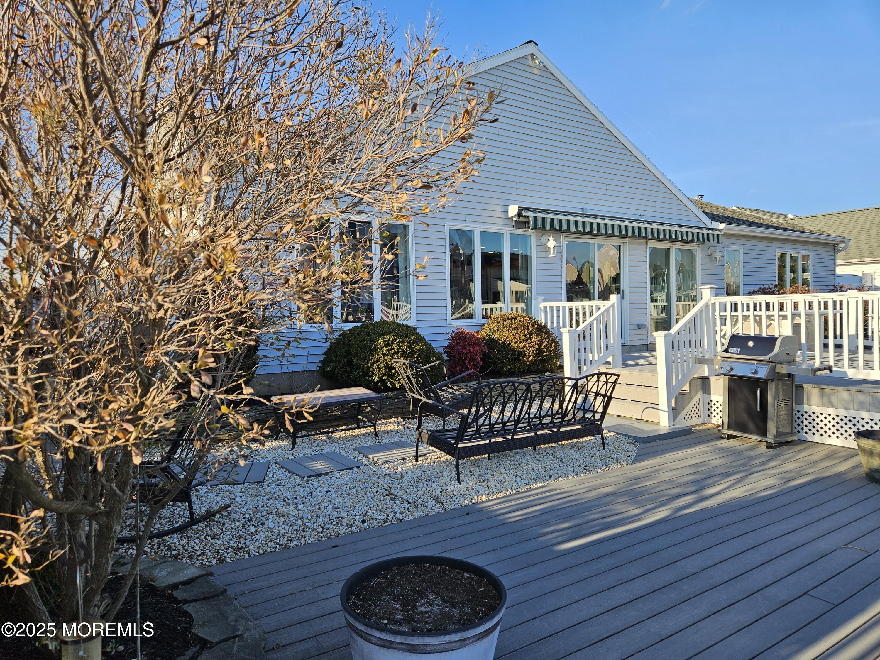 837 Forepeak Drive Forked River, NJ 08731 - Photo 2 of 55 a front view of house with outdoor seating