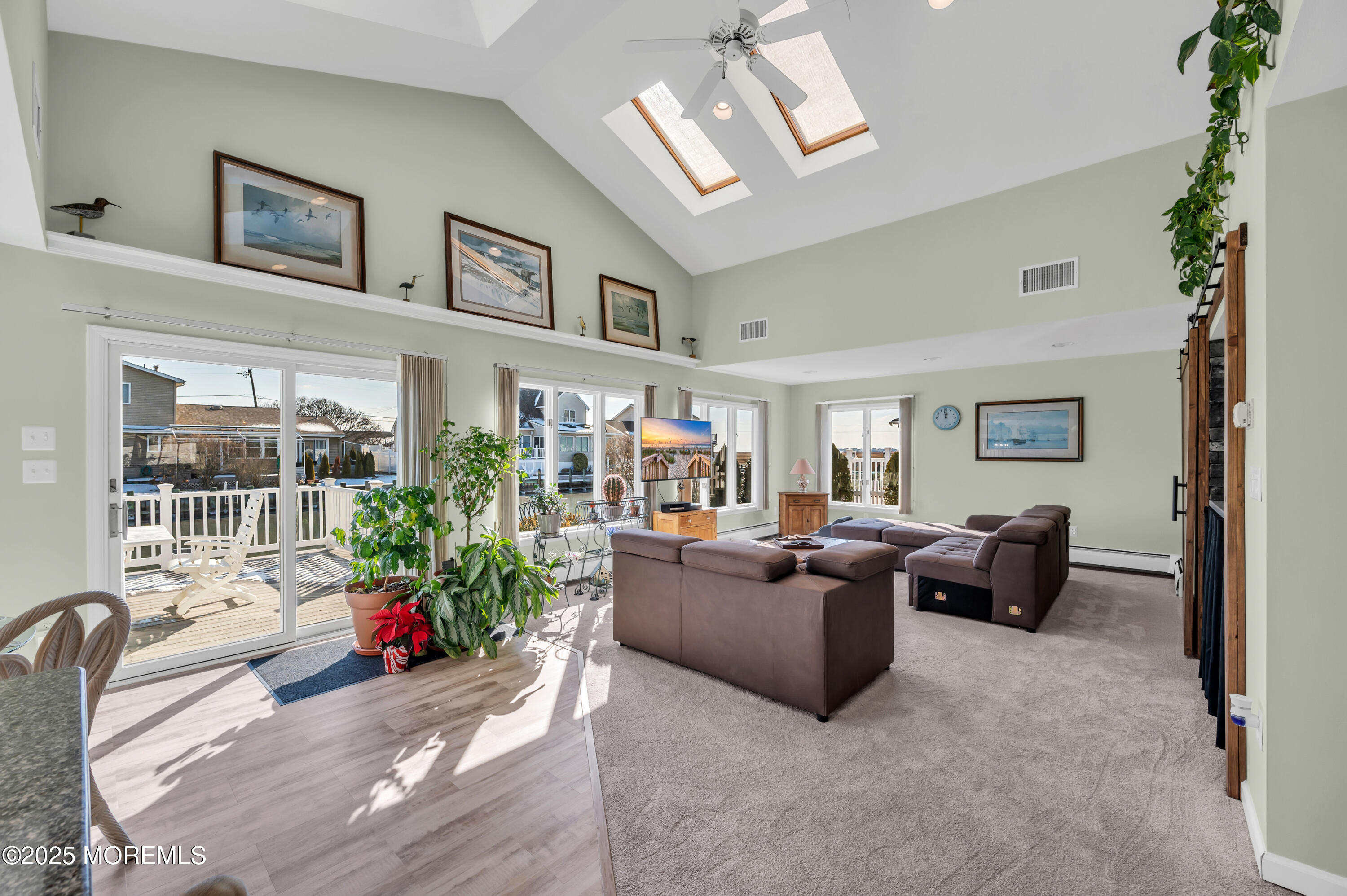 837 Forepeak Drive Forked River, NJ 08731 - Photo 22 of 55 a living room with furniture and a potted plant