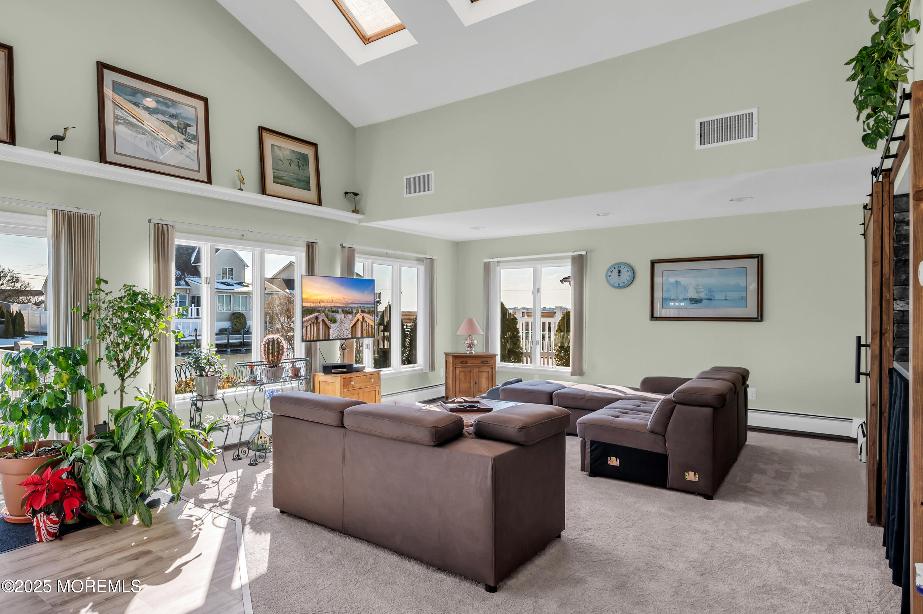 837 Forepeak Drive Forked River, NJ 08731 - Photo 23 of 55 a living room with furniture and a potted plant