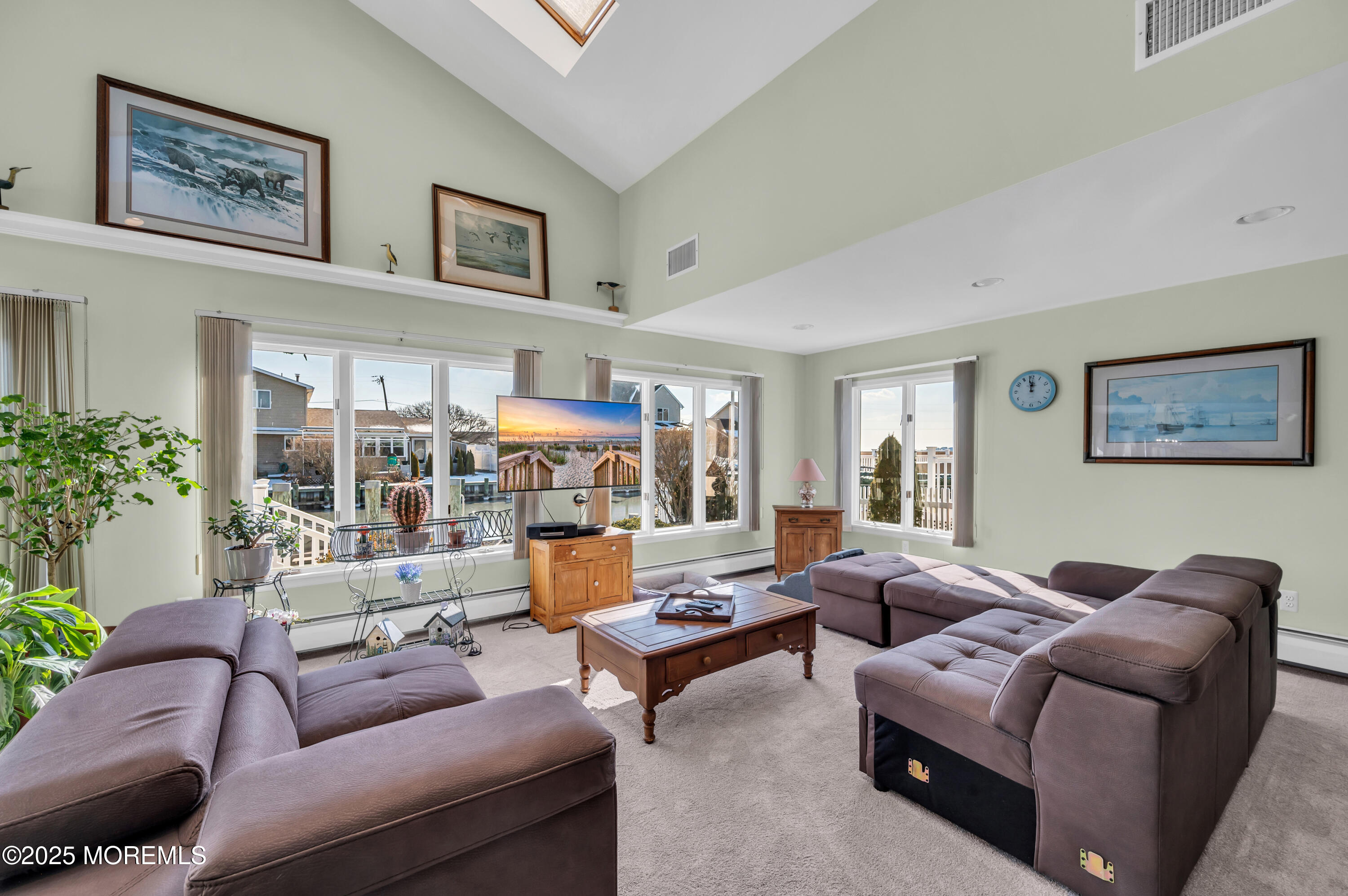 837 Forepeak Drive Forked River, NJ 08731 - Photo 24 of 55 a living room with furniture and a large window