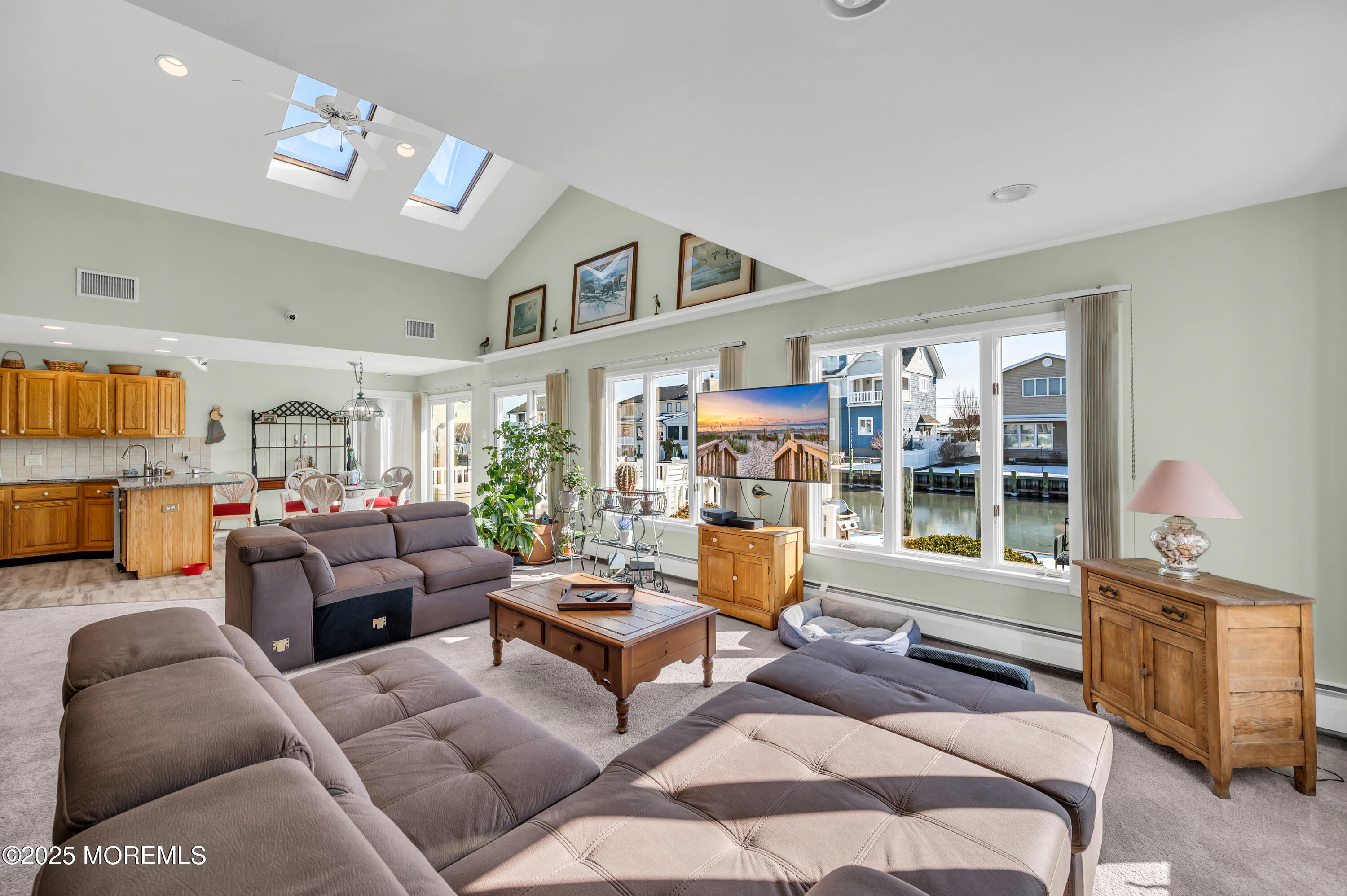 837 Forepeak Drive Forked River, NJ 08731 - Photo 27 of 55 a living room with furniture and a large window