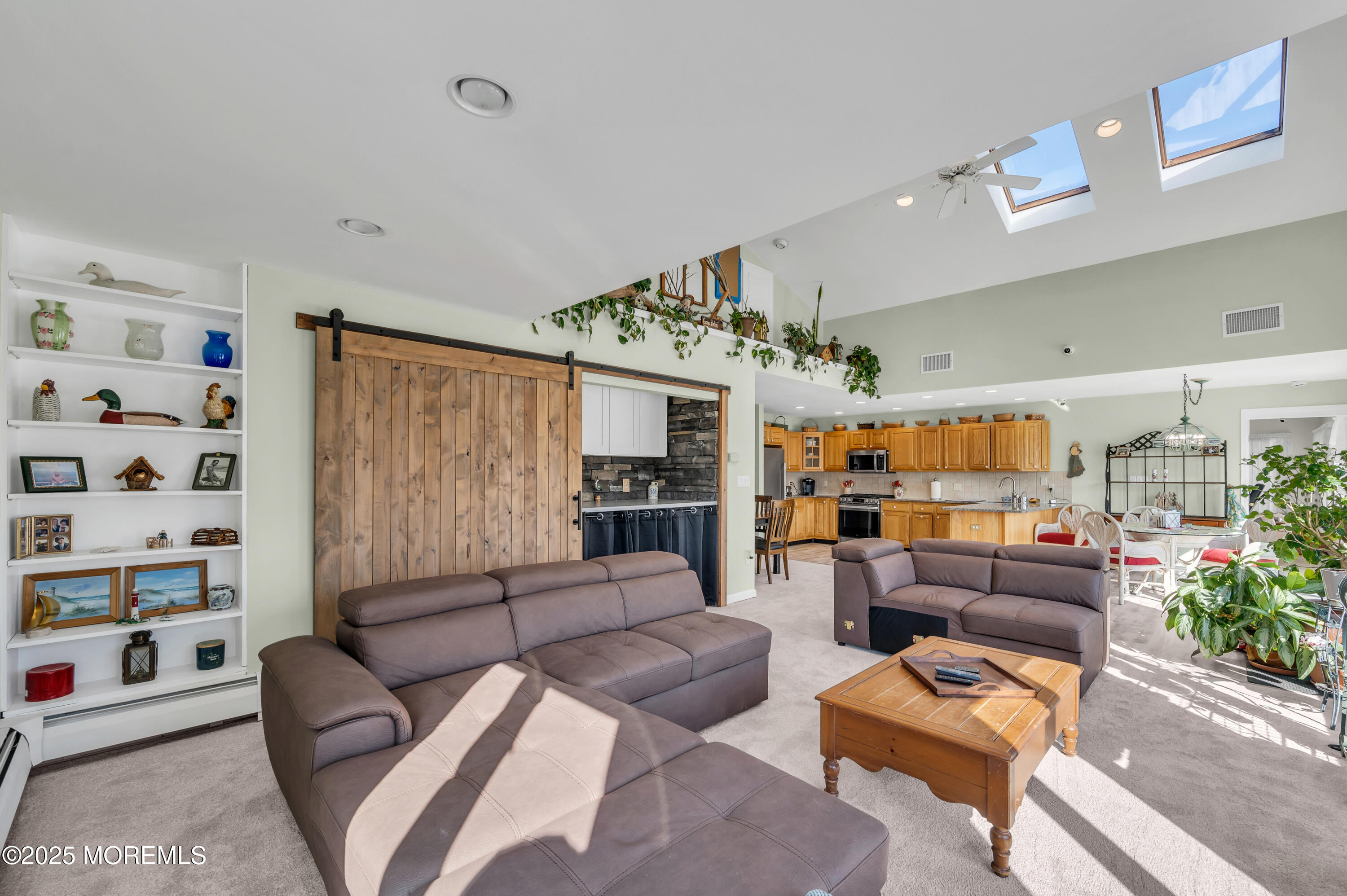 837 Forepeak Drive Forked River, NJ 08731 - Photo 28 of 55 a living room with furniture fireplace and a flat screen tv
