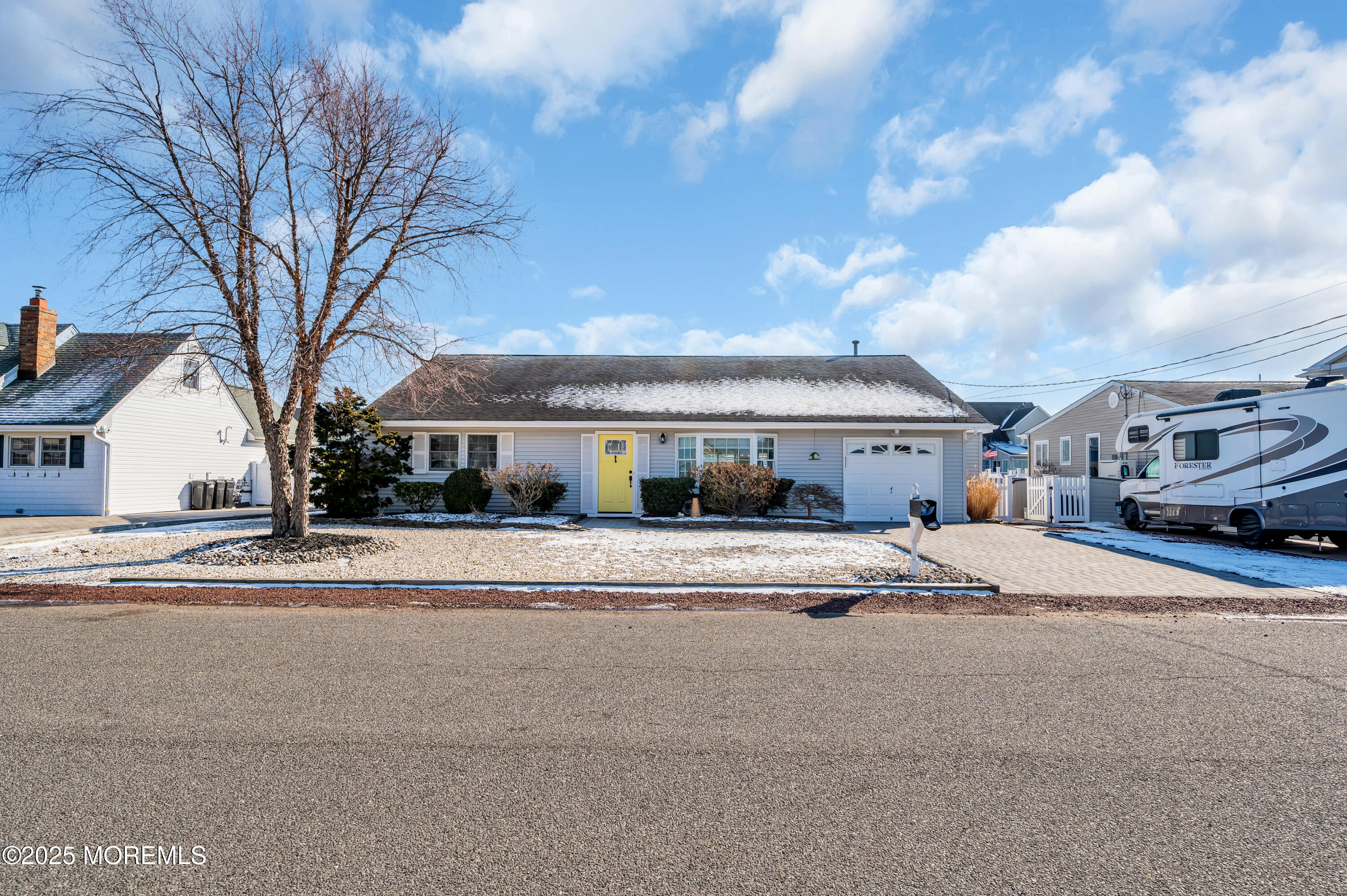 837 Forepeak Drive Forked River, NJ 08731 - Photo 33 of 55 a front view of a building with lot of cars and trees