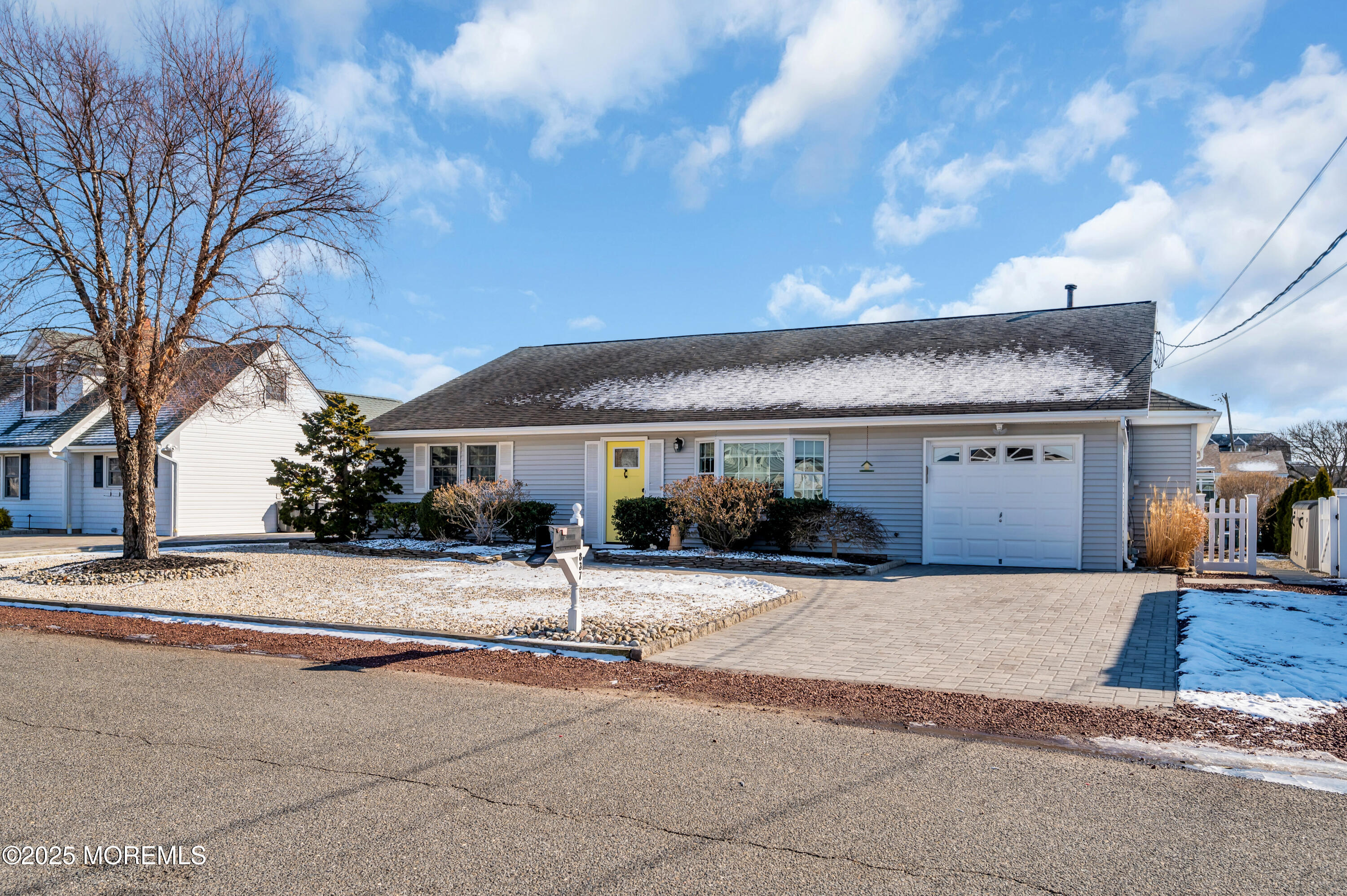 837 Forepeak Drive Forked River, NJ 08731 - Photo 35 of 55 a front view of a house with a yard and garage