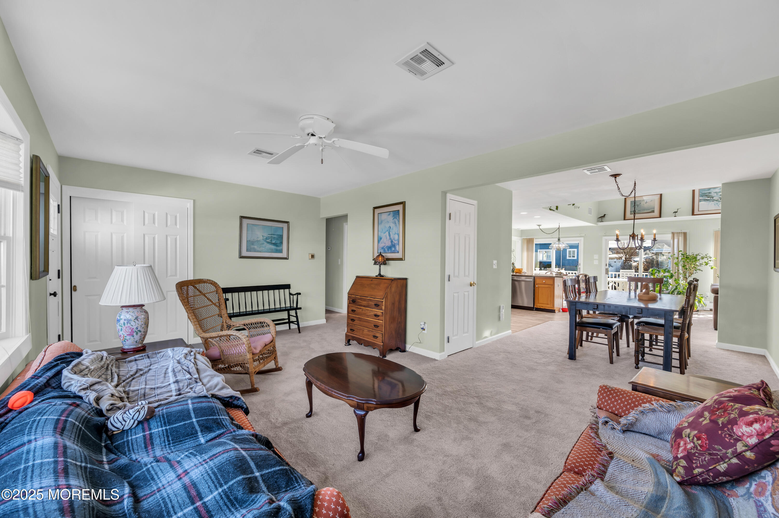 837 Forepeak Drive Forked River, NJ 08731 - Photo 50 of 55 a living room with furniture and a table