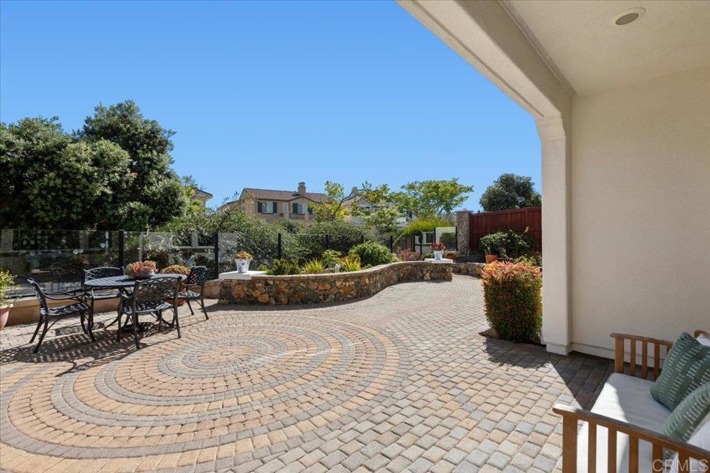 838 Luminara Way San Marcos, CA 92078 - Photo 52 of 54 a swimming pool with outdoor seating and yard