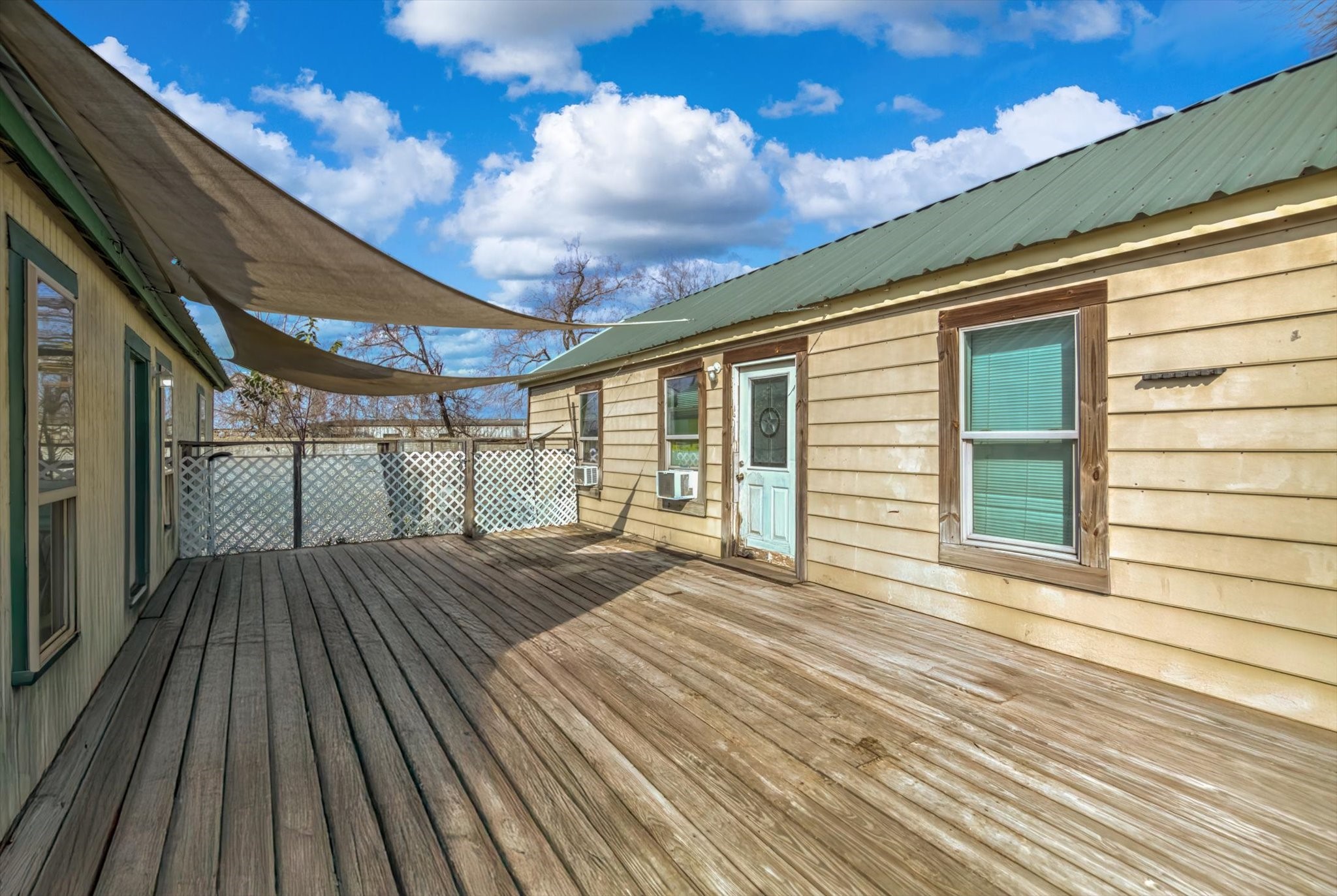 14929 Henry Road Houston, TX 77060 - Photo 9 of 13 a view of backyard with a deck