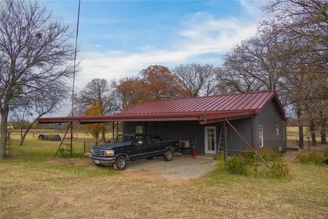 a view of a car in front of house