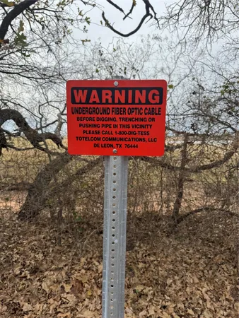 a sign broad on the side of the road