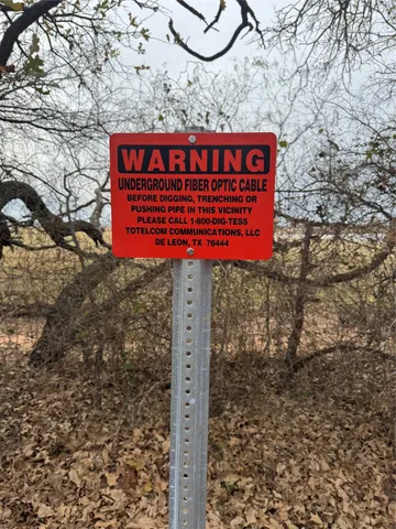 a sign broad on the side of the road