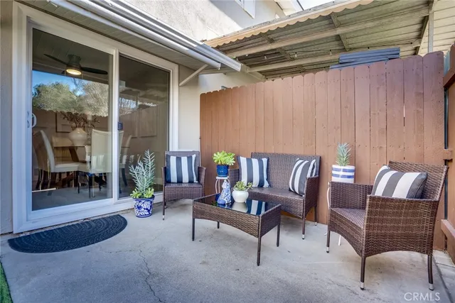 a outdoor living space with furniture and a couch