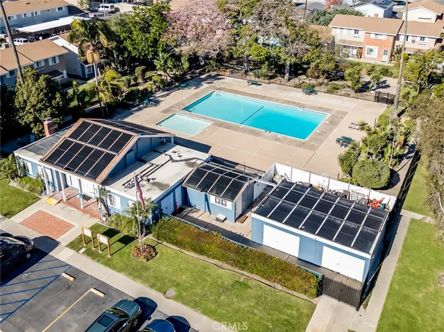 a view of a backyard with sitting area