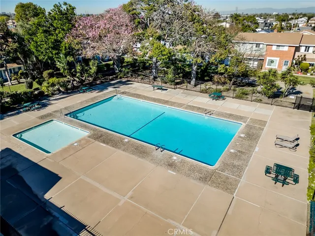 a view of a swimming pool with a patio