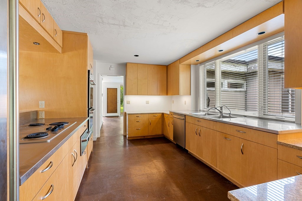 91 Weston Road Lincoln, MA 01773 - Photo 12 of 34 a large kitchen with a large window