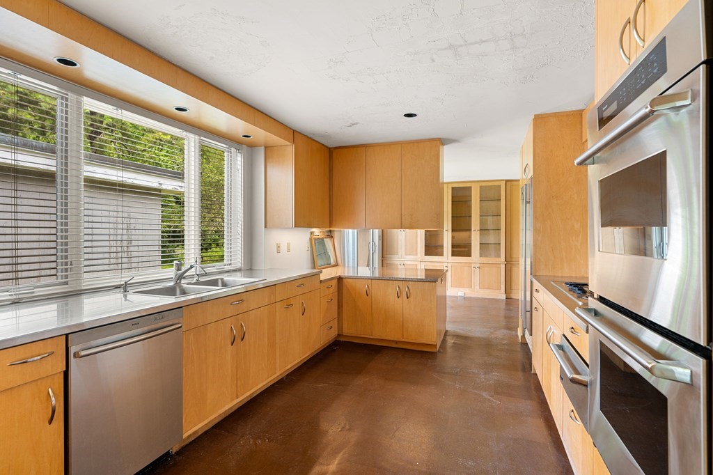 91 Weston Road Lincoln, MA 01773 - Photo 13 of 34 a large kitchen with a large window