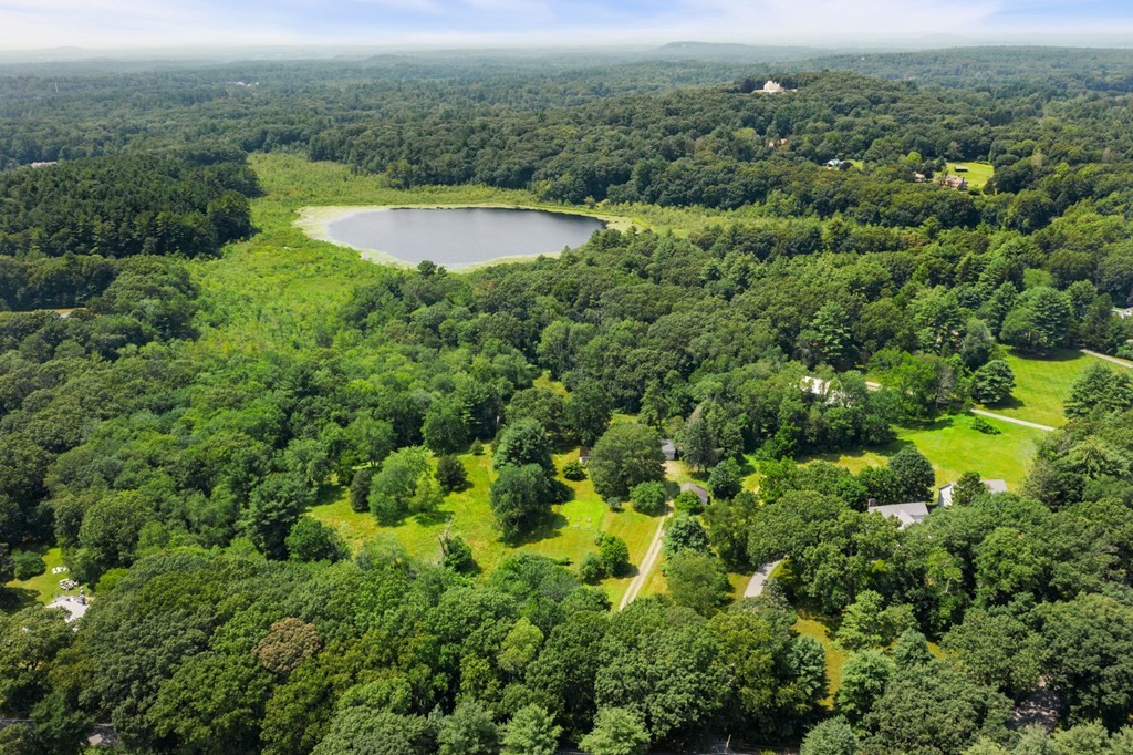 91 Weston Road Lincoln, MA 01773 - Photo 5 of 34 an aerial view of residential houses with outdoor space and trees