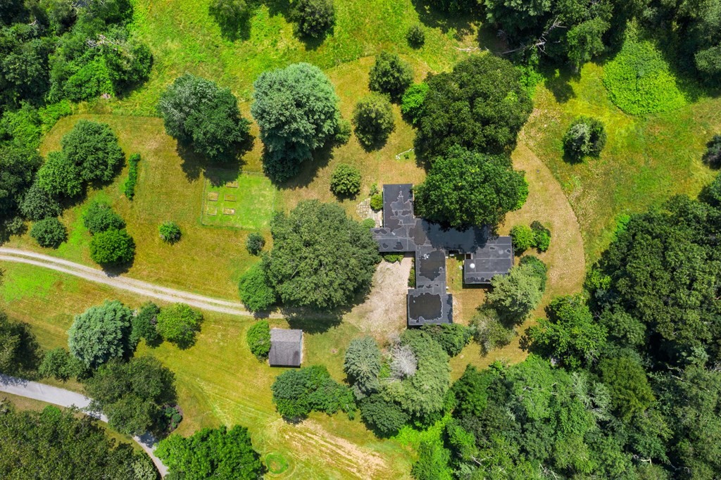 91 Weston Road Lincoln, MA 01773 - Photo 6 of 34 an aerial view of a house with a yard