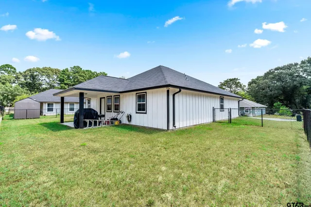 a house view with a garden space