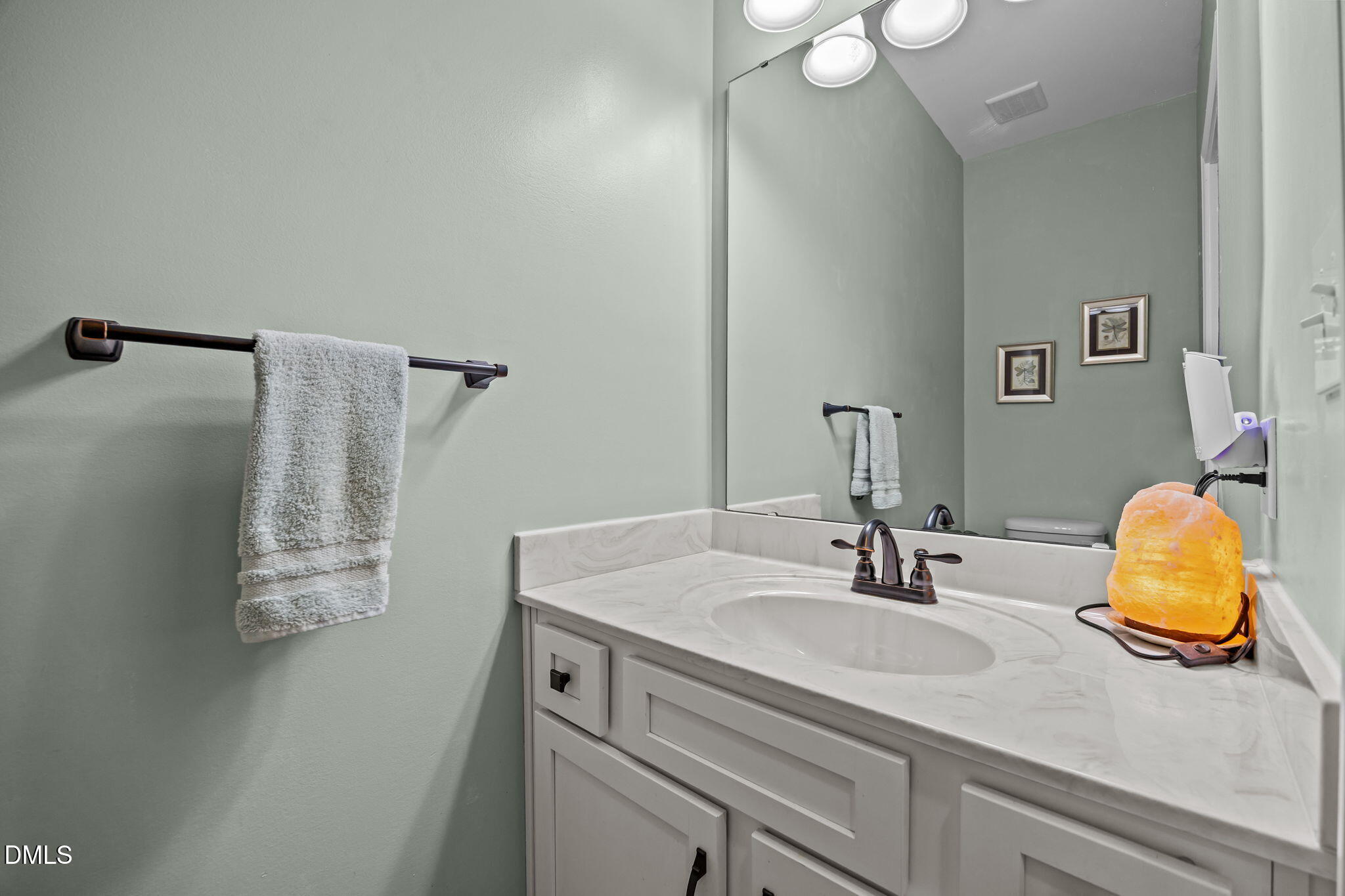 3225 Back Acres Road Efland, NC 27243 - Photo 19 of 57 a bathroom with a sink and vanity