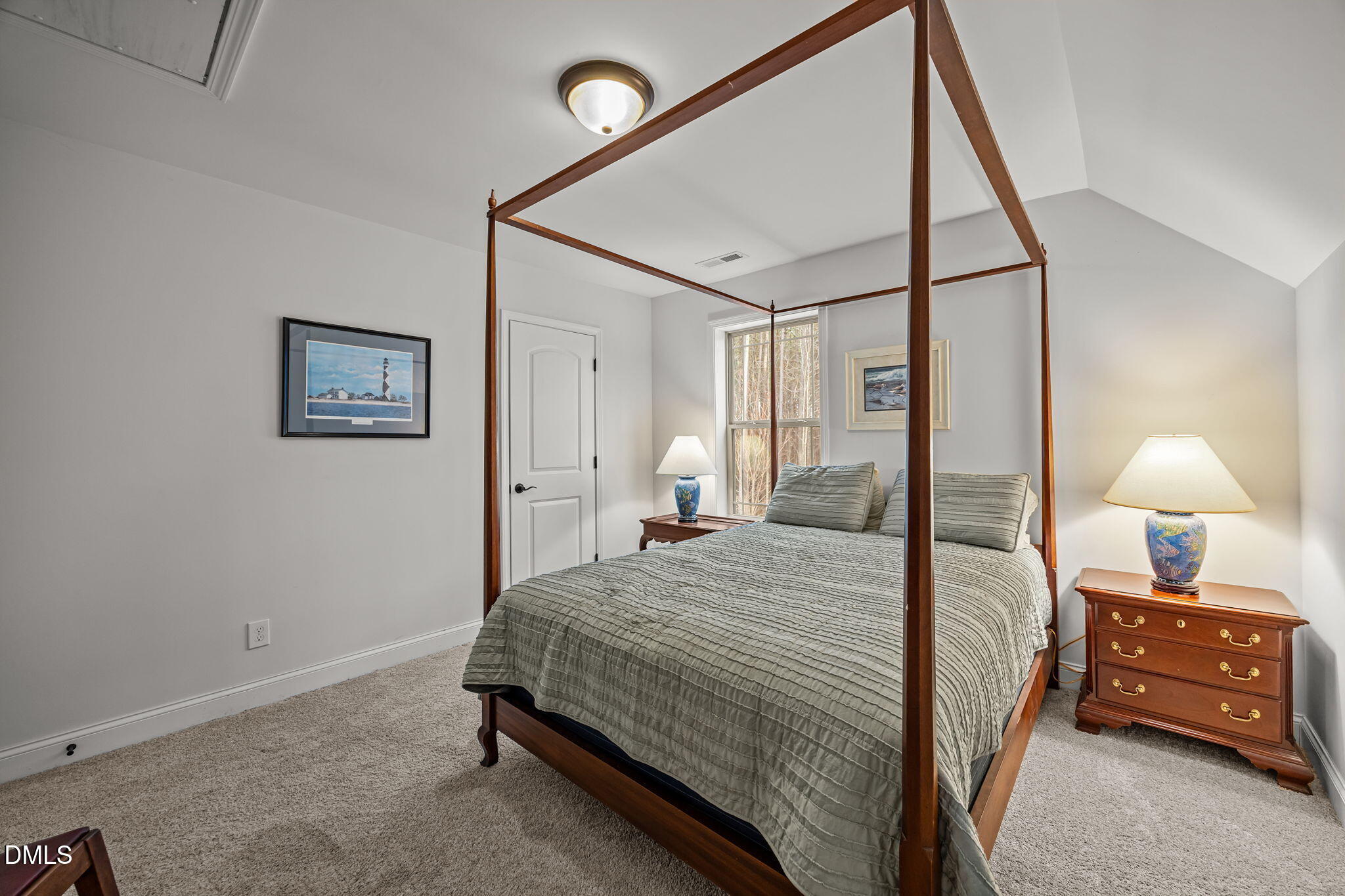 3225 Back Acres Road Efland, NC 27243 - Photo 23 of 57 a bedroom with a bed and a lamp