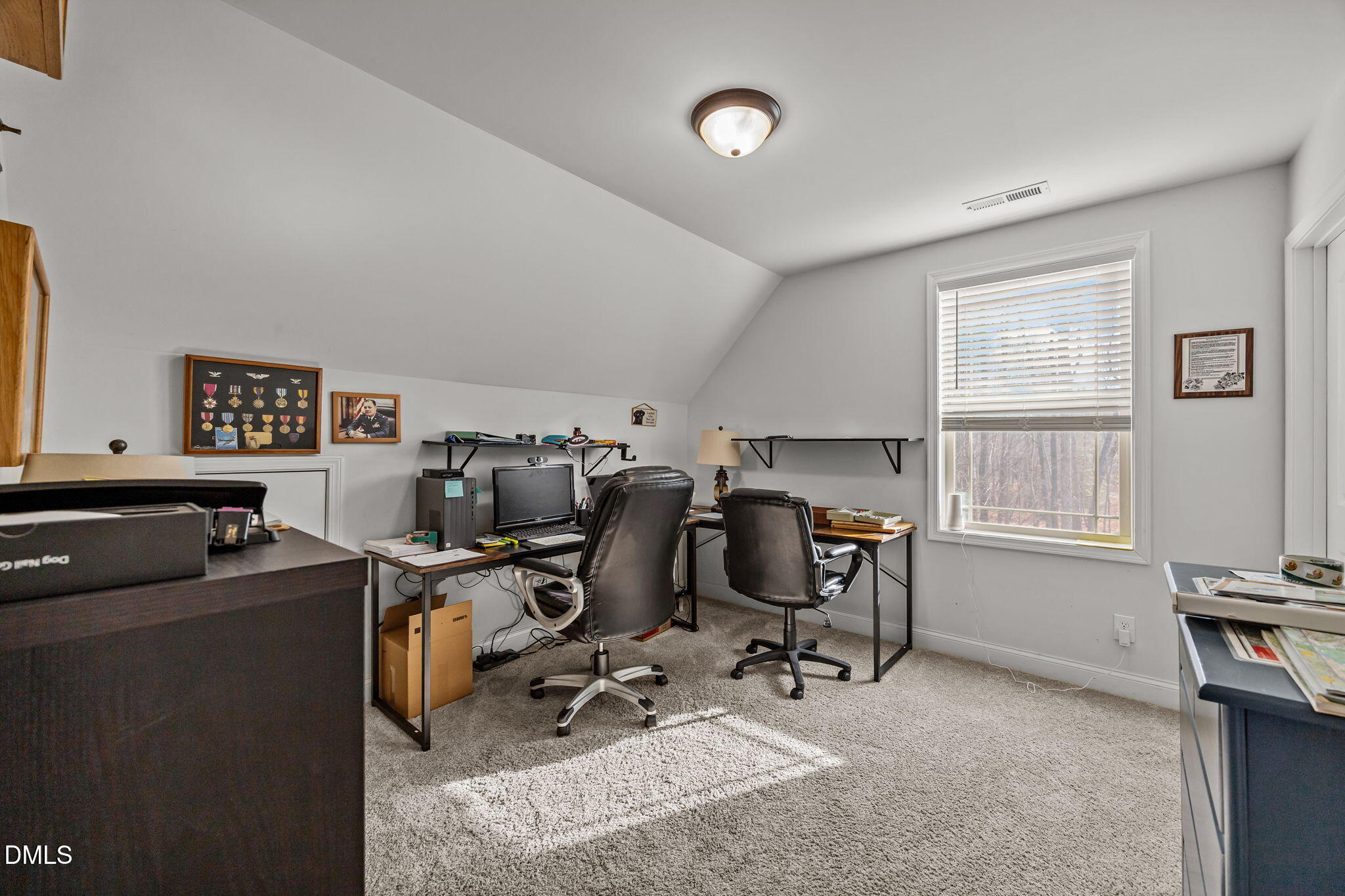 3225 Back Acres Road Efland, NC 27243 - Photo 25 of 57 a view of a workspace with furniture and a window